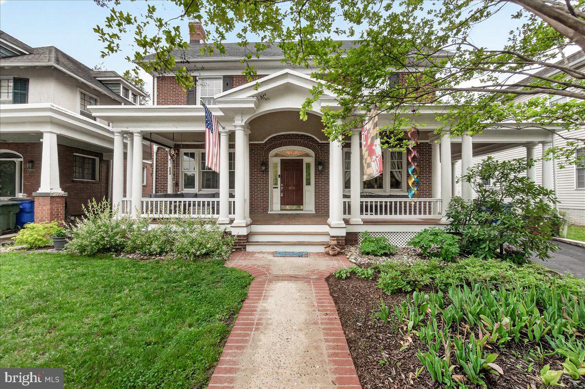 This charming 1930 Colonial home in Oak Hill offers 2,295 sq. ft. of well-designed living space, featuring five spacious bedrooms and two and a half bathrooms. The traditional floor plan includes a formal dining room and a cozy breakfast area, perfect for gatherings. Enjoy the warmth of the fireplace in the inviting living room, complemented by hardwood and vinyl flooring throughout. The kitchen is equipped with modern appliances, including a gas oven/range, dishwasher, and microwave, along with ample pantry space and a convenient eat-in area. The full basement provides versatile space with outside access, while the detached garage offers parking convenience. The property sits on a 0.21-acre lot, providing outdoor space for activities. With insulated windows and a blend of classic and contemporary features, this home is ready to meet your needs.
