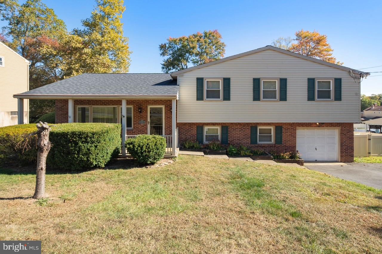 Welcome to this stunning four-bedroom, two-and-a-half-bath split-level home, where comfort and convenience meet!
 
As you arrive, you'll be greeted by a spacious covered front patio—perfect for sipping your morning coffee or unwinding in the evening. Step inside to discover a charming sitting room, a cozy dining area, and a well-appointed kitchen on the first floor, all designed for easy living and entertaining.
 
Upstairs, you’ll find four inviting bedrooms and two full bathrooms. The primary room features a private bathroom with a shower stall and a generous walk-in closet. Each bedroom is equipped with its own closet, complete with lighting and shelving, while the smaller room offers access to the lighted attic for additional storage. The main bathroom includes a convenient shower/tub combination and a closet.  A linen closet is located in the hallway for added organization.
 
Venture to the lower level, where a spacious family room awaits—ideal for relaxation and gatherings. Off the family room, you’ll find a spacious laundry/utility area, complete with a washer and dryer, as well as a convenient half bathroom. There’s also access to the crawl space with concrete floor which can be used for even more storage.
 
The garage is a true gem, featuring a built-in tool bench and ample shelving for pool equipment and other storage needs. For added peace of mind, a built-in generator is attached to the one-car garage.
 
Step outside to the backyard oasis, where you’ll find a deck complete with a retractable awning—perfect for enjoying sunny days. 
 
The fenced in backyard is divided with a fence separating the in-ground pool from the rest of the backyard with a shed for storing outdoor or pool equipment, such as the detachable railing for the in-ground pool.
 
Located within minutes of Rt 322 and access to 1-95 or the Baltimore Pike, this home truly offers the perfect blend of relaxation and functionality!