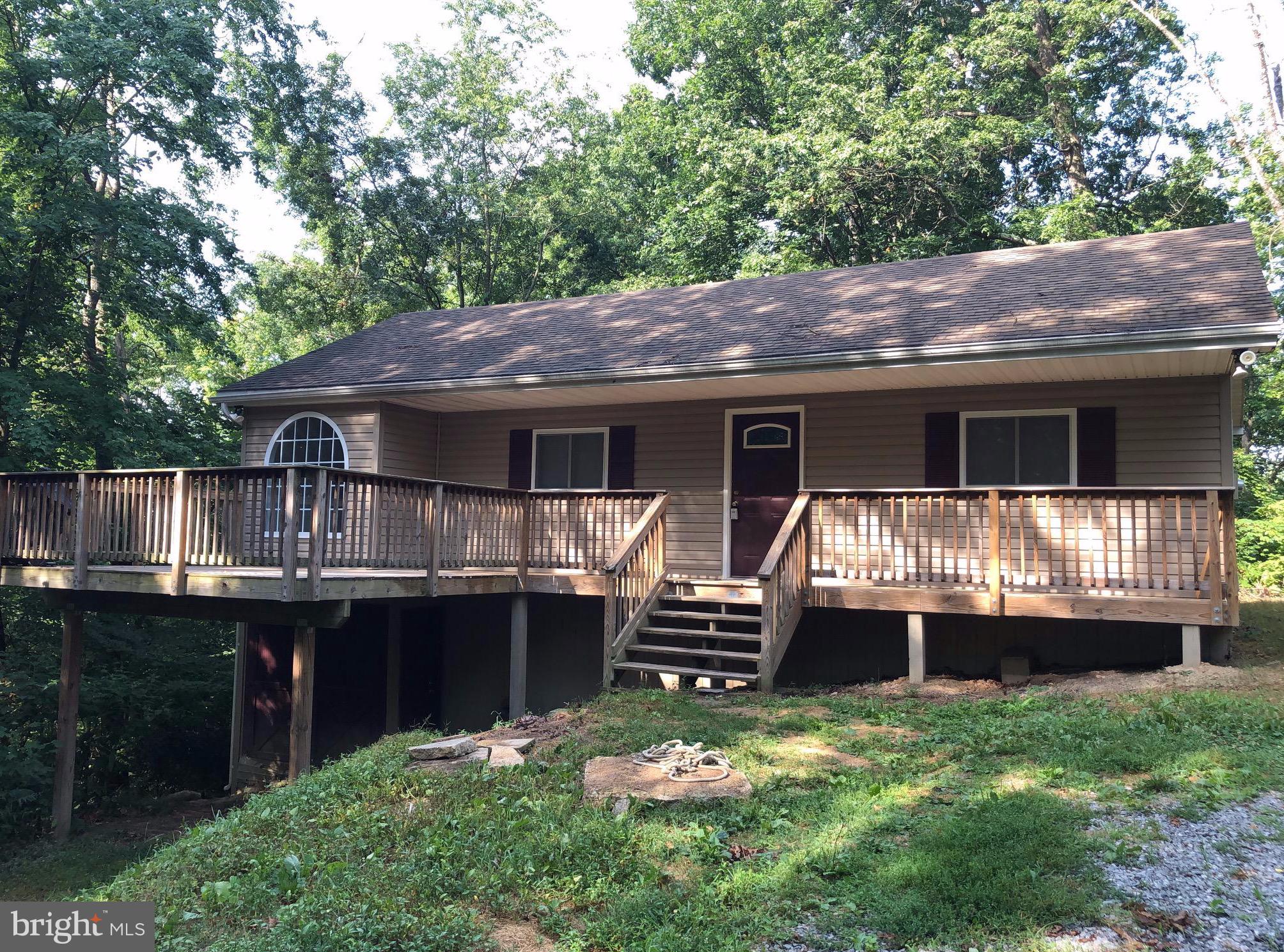 Come to the peace and quiet of Glenwood Forest - just 15 minutes from I81 for ease of commuting but worlds away from the hustle and bustle. Remodeled and move-in ready starter/retirement home on 1 acre in the country.  Completely remodeled in 2013 with CAC/heat pump, new vinyl siding, windows, deck and new roof. Updated this year with new flooring. Seller providing 1 year HWA home warranty ($450) value.