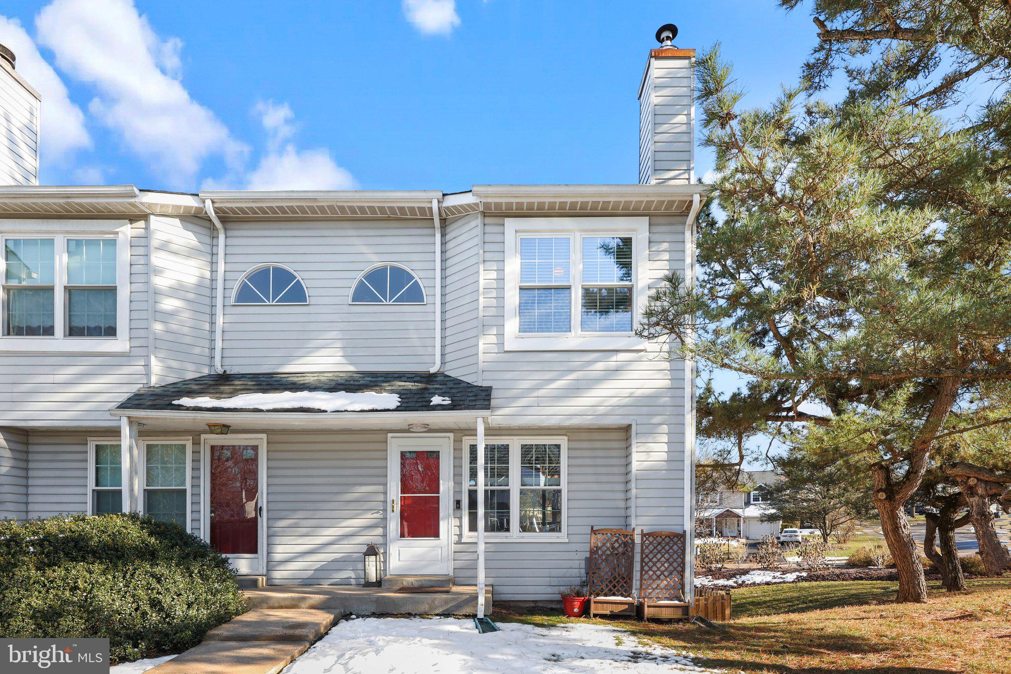 Welcome to 12 Old Mill Lane. Rarely do you find an end unit townhome with finished walk-out basement in Council Rock School District in move-in condition. When you enter this wonderful townhouse you are greeted by hardwood floors on then main level and new carpeting on the upper level and in the basement. The main floor features living room with fireplace with pellet stove, kitchen with stainless appliances, dining room with sliding doors to new deck that overlooks a treeline and powder room. Upstairs you'll find main bedroom with plenty of closet space, 2nd bedroom with closet built-ins, 2nd floor laundry with washer/dryer included and full bathroom. Enjoy the finished walkout basment with beautiful new full bathroom. Use as an office, playroom or guestroom with murphy bed included. Walk outside to the fenced- in backyard and new shed. There are replacement windows throughout. The roof was replaced 2011. Nothing to do here but unpack and relax! Conveniently located midway between shops and restaurants in Richboro and Newtown, within walking distance to Tyler State Park and close to schools, trains and all major arteries. Just what you have been waiting for!