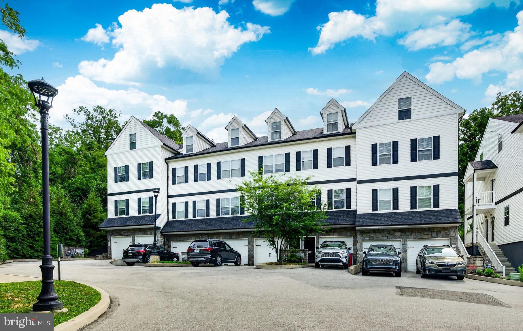 Welcome to 123 Colwell Lane, a beautifully maintained 2 bedroom, 2 full bath interior unit in a prime Conshohocken location. Just a short walk to the train, the Schuylkill River Trail, and Conshohocken’s popular restaurants and shops, this home offers a hard-to-beat combination of convenience, comfort, and access to everything the borough has to offer.

Inside, the main living area features hardwood floors, granite countertops, stainless steel appliances, and coffered ceilings that give the living and dining space a polished feel. The kitchen features shaker-style cabinetry with crown molding, a gas range, built-in dishwasher, microwave, and refrigerator, with sliding glass doors leading directly to the deck.

The main level primary suite offers a spacious closet and an en suite bath with a double vanity, tiled shower, and linen closet. Downstairs, the second bedroom is generously sized and also includes its own full en suite bath, making it a great setup for guests, a roommate, or flexible work-from-home space.

Additional highlights include a 1-car garage,  a high-efficiency electric heat pump, and a PEX plumbing system. The  association handles exterior building maintenance, lawn care, snow removal, trash, common area maintenance, and a master insurance policy that helps reduce each unit owner’s individual insurance premium.

Whether you’re looking for low-maintenance living, walkability to town, or a home with a functional layout in a commuter-friendly location, 123 Colwell Lane offers all of that in the heart of Conshohocken!
