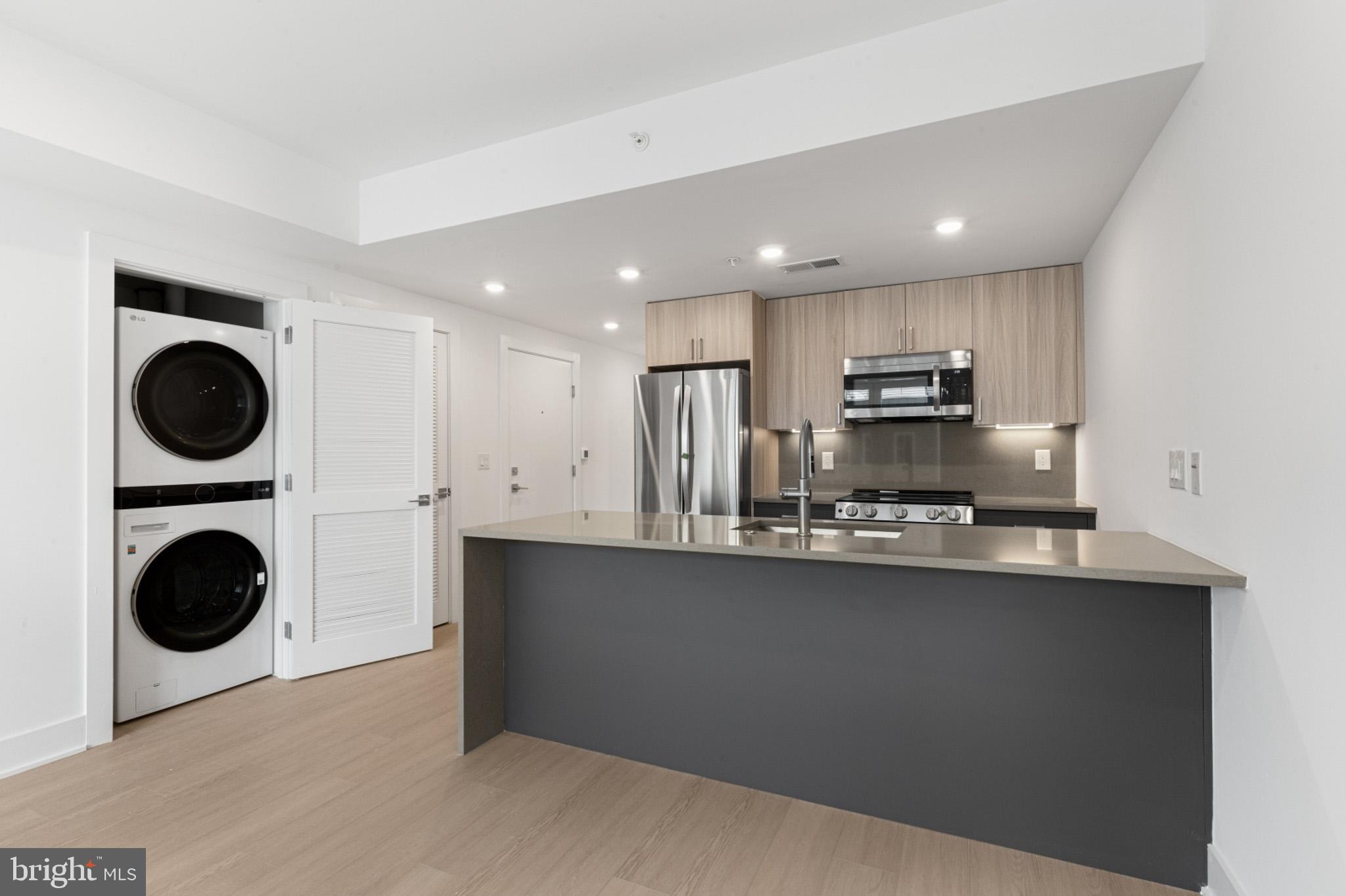 Available Now | Leasing Special: Advertised price reflects 14 month leases only. Inquire for 12 month lease prices! Only 1st month and 1-month security deposit are due prior to move in! 

Welcome to Beacon Flats, where modern finishes and prime location meet in the heart of Fishtown. Each unit features central A/C, in-unit laundry, contemporary fixtures, and sleek stainless steel appliances. Unit #607 is a 1 bedroom, 1 bathroom apartment on the sixth floor. Enjoy being just steps away from popular spots like Forin Cafe, Stelio's Pizza, Rowhome Coffee, Starbolt, and Sacred Vice Brewing. Surrounded by convenient grocery stores, parks, and public transit including the Market-Frankford Subway line servicing Center City, University City, and beyond.

Amenities & Building Features:
Modern, pet-friendly studio, one-bedroom, and two-bedroom layouts.
Fully equipped gym featuring Star Trac equipment and free weights.
Spacious co-working spaces for remote work or studying.
Large roof deck with stunning views of the city, accessible via elevator and stairway.
Pet area for your furry friends to enjoy the outdoors.
Butterfly Security System with personalized codes for secure deliveries.
Mail and package room for added convenience.
Bike room and storage cages in the basement.

Lease Terms:

Generally, 1st month, 12th month, and 1 month security deposit due at, or prior to, lease signing. Other terms may be required by Landlord. $55 application fee per applicant. Pets are conditional on owner's approval and may require an additional fee, if accepted. (Generally, $500/dog and $250/cat). Tenants responsible for: electricity, cable, flat water fee ($40/month for 1bed, $60/month for 2bed), and a $35/month required amenity fee which includes Xfinity Wifi, lounge, gym, pet park, roof access. Landlord Requirements: Applicants to make 3x the monthly rent in verifiable net income, credit history to be considered (i.e. no active collections), no evictions within the past 4 years, and must have a verifiable rental history with on-time rental payments. Exceptions to this criteria may exist under the law and will be considered. Please note: photos & video tour may be of a similar unit within the building; exact layouts & finishes may vary.