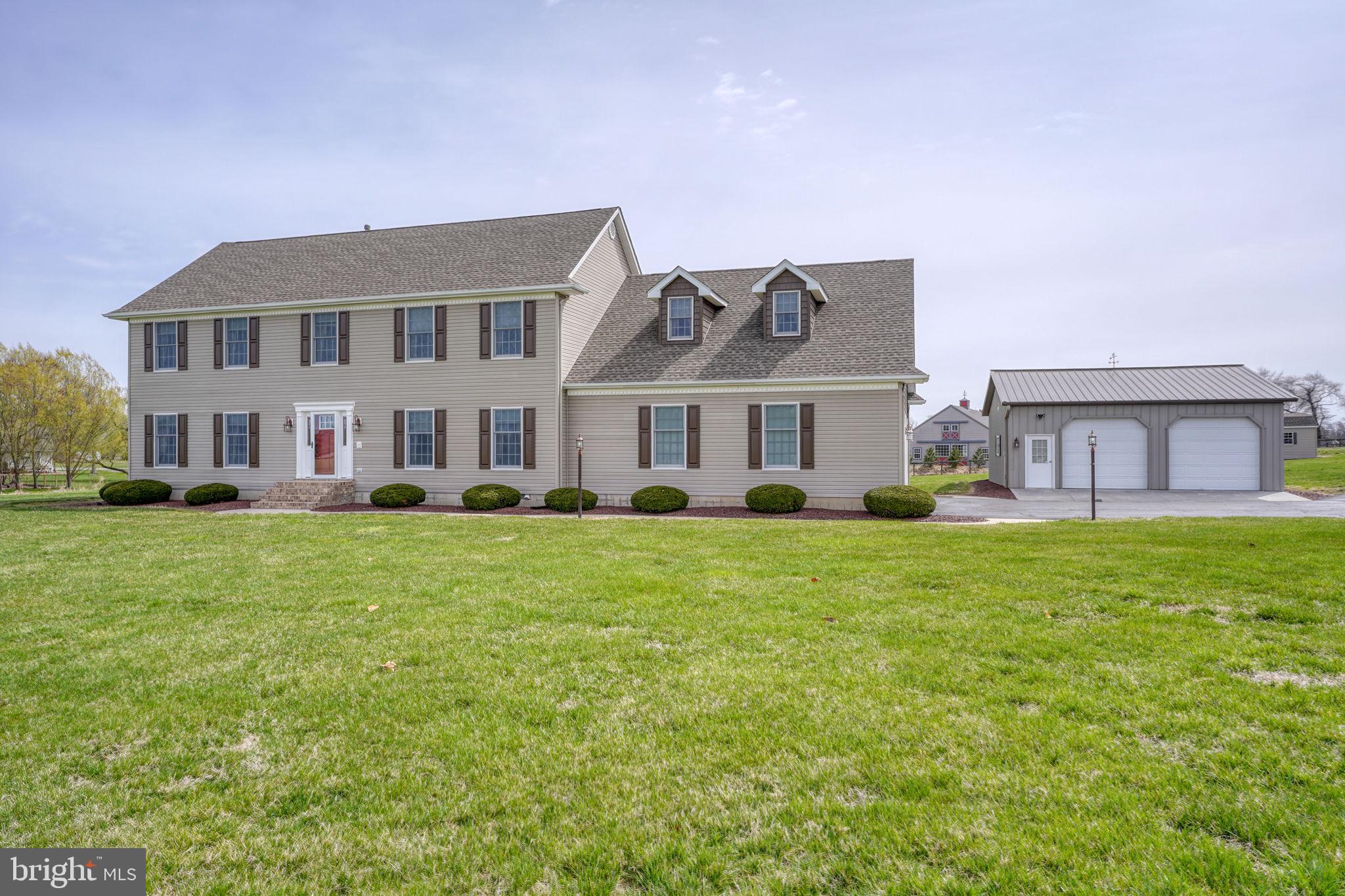 Back on the Market! All inspections (home, termite, radon, septic) have been completed, and the few major defects identified have already been addressed. 
Welcome to a truly exceptional property offering the perfect blend of space, quality, and versatility. Situated on 2.57 picturesque acres in the highly sought-after Caesar Rodney School District, this impressive home boasts over 3,000 square feet of beautifully designed living space, outstanding updates, and incredible outbuildings rarely found at this price point.
From the moment you step inside, you'll appreciate the home's expansive layout, oversized rooms, and timeless appeal. Designed for both everyday living and effortless entertaining, the main level features a private office or formal living room, an elegant dining room, and a spectacular great room anchored by a warm gas fireplace—the perfect gathering place for family and friends.
Upstairs, the luxurious primary suite is a retreat of its own, complete with an enormous bonus room ideal for a private sitting room, home office, fitness space, nursery, or whatever best fits your lifestyle. Four generously sized bedrooms, two-and-a-half baths, and a heated screened porch with newer vinyl windows provide comfort and flexibility for every stage of life.
Step outside and discover what truly sets this property apart. The oversized heated three-car attached garage is complemented by an outstanding 30' x 30' heated and insulated Morton building with a 12' x 27' attached addition,  creating endless possibilities for car enthusiasts, contractors, hobbyists, small business owners, or anyone in need of exceptional storage and workspace. A separate 12' x 12' utility shed with a concrete pad and ramp, along with an irrigation system servicing the beautifully maintained grounds, further enhances this remarkable property.
Major mechanical updates have already been completed, allowing you to move in with confidence. Recent improvements include an approximately five-year-old roof with premium GAF Timberline HD shingles, a whole-house generator (2018), Rinnai tankless water heater (2023), Trane HVAC system, and a professionally encapsulated crawl space for improved efficiency and long-term protection.
Opportunities like this are becoming increasingly rare. Few homes offer this combination of acreage, over 3,000 square feet of living space, premium outbuildings, extensive upgrades, and a prime Caesar Rodney location - all at this exceptional value.
Schedule your private tour today and experience everything this outstanding property has to offer!