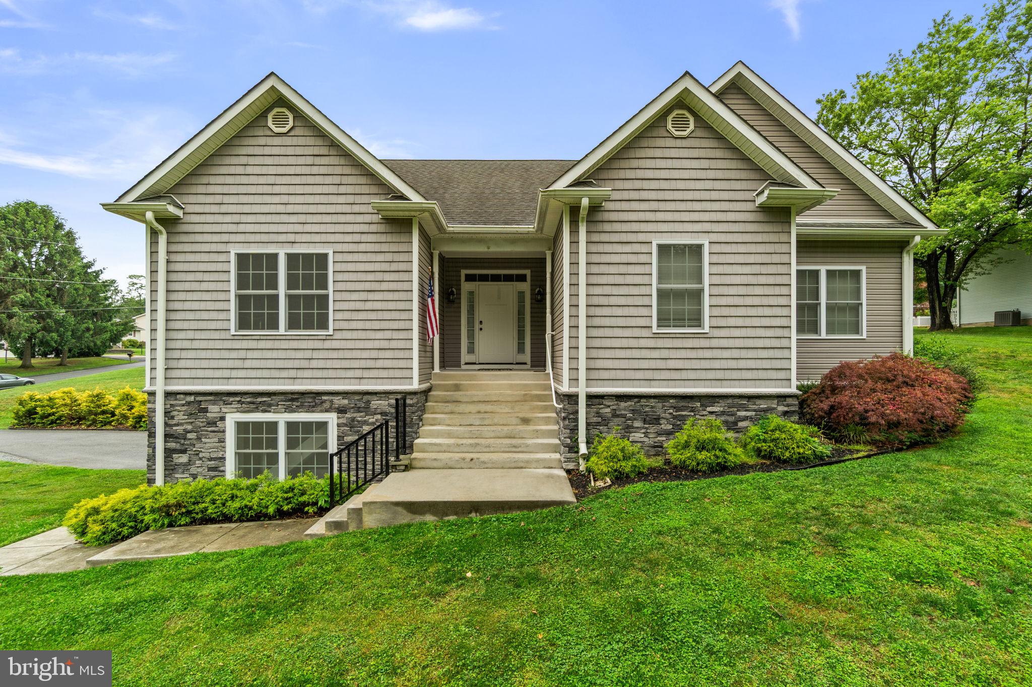 Nestled on nearly an acre in a peaceful Sykesville setting, this beautifully crafted ranch-style home seamlessly blends modern comfort with timeless charm. Inside, soaring ceilings, rich hardwood floors, Quartz Countertops, spacious breakfast bar, electric fireplace and an open-concept layout create a warm and inviting atmosphere ideal for everyday living.
The main floor features three spacious bedrooms, including a private primary suite complete with an en-suite bath and walk-in closet with custom built-in shelving. Main level laundry room and custom blinds throughout add both style and convenience. The finished lower level offers a spacious clubroom, full bath, finished bonus room, and an expansive storage areas, with direct access to both the exterior and garage.
Step outside to an exceptional outdoor retreat featuring a spacious deck, custom stone patio, pergola, and fire pit — perfect for relaxing evenings and year-round gatherings. Conveniently located near commuter routes, shopping, dining, and the charm of downtown Sykesville, this home offers the perfect balance of privacy, comfort, and convenience.