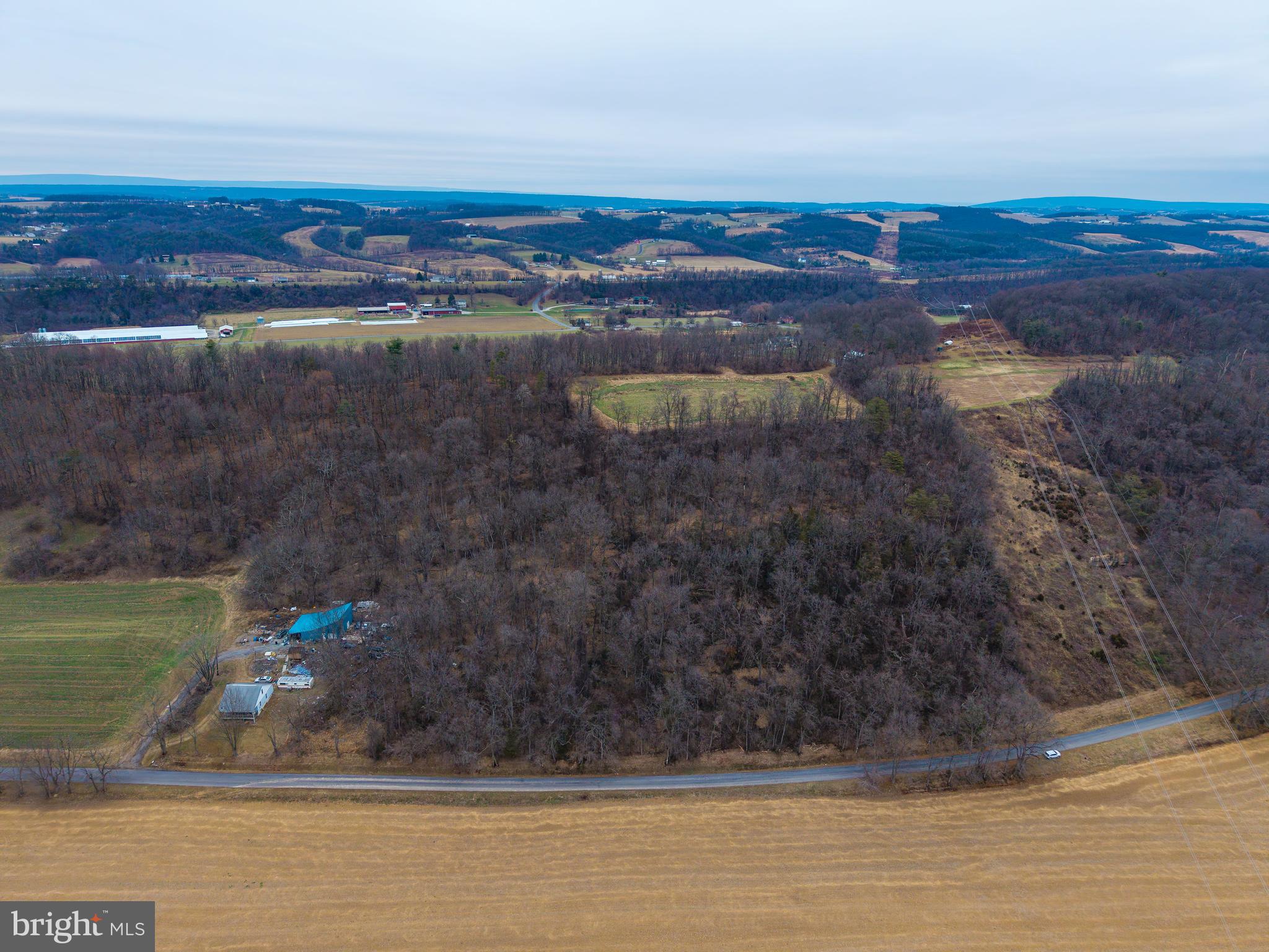 Welcome to this 12.3 acres wooded tract of land in Snyder County! This property boasts ample space for hunting or to build your dream home on. Nestled across the street from vast acres of farmland, this piece of land provides a secluded and private escape. Don't wait, the opportunities are endless!