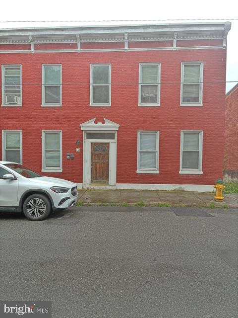 Investor alert: Great investment opportunity! Live in 1 unit and rent out the other. Building contains 2 units- each 2 bedroom, 1 bath. Appliances convey. Lower unit has rear deck. Rear alley or street parking and backyard.