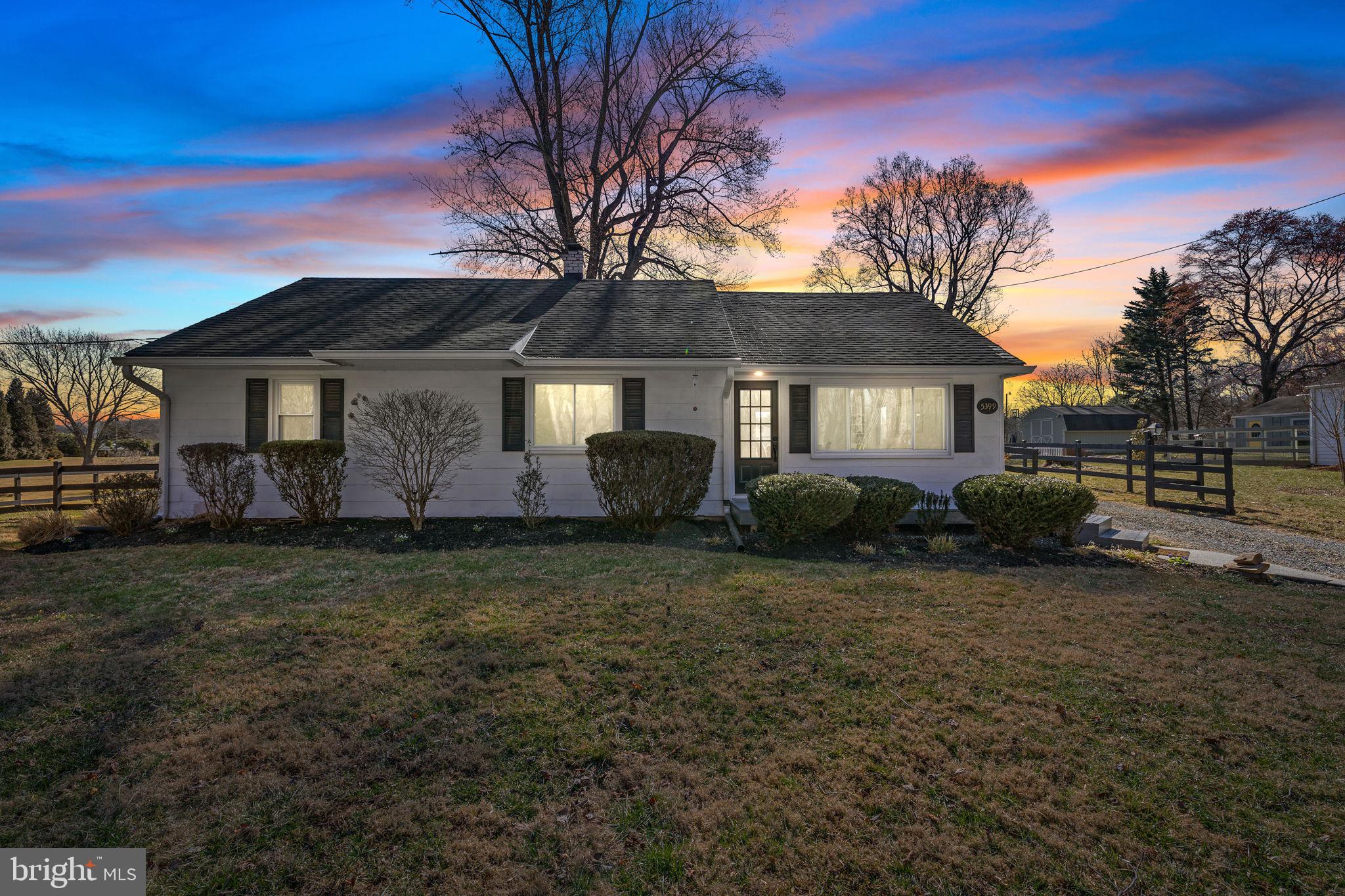 **OFFER DEADLINE IS SET FOR MONDAY 3/17 AT 2PM**Conveniently located on the DC side of Warrenton near Route 29, this charming rambler-style farmhouse is a hidden gem with incredible outdoor space. The flat, fenced backyard is an absolute dream—complete with a paver stone patio, pergola with lights, and a cozy fire table, all surrounded by lush landscaping and scenic views.

Inside, you'll find three well-sized bedrooms and an updated full bathroom. The bright white kitchen was updated in 2020, offering ample space for cooking and gathering. The open-concept living and dining areas feature large windows, updated flooring, and modern lighting, creating a warm and inviting atmosphere.

The sunroom is a standout space, filled with natural light and offering newer flooring, a newer washer and dryer, and direct access to both the backyard and driveway—ideal for everyday convenience.

This home is loaded with recent updates, including new windows and doors, whole-home paint,  a newer oil tank and furnace, a new water filtration system, and more. Plus, the partially finished basement provides valuable flex space or additional storage.

Outside, the huge driveway offers plenty of parking for cars, guests, and equipment. Don't miss this perfect blend of charm, updates, and an unbeatable location—schedule your showing today! **Fun Fact: There are original hardwood floors under the bedroom carpets! UPDATES: Switches and outlets (2025), water reserve tank and piping (2025), copper pipe plumbing (updated over the last 5 years, some in 2024), water filtration system (2024), patio (2024), dishwasher (2024), windows (2024, lifetime transferable warranty), front door (2024, lifetime transferable warranty), decks redone (2023), sunroom and family/dining room flooring installed (2023), oil tank and connections (2022), fence (2021), washer/dryer (2021), HVAC oil heater (2020), water heater (2020), toilet (2020), spray insulation entire attic (2020), cabinets and countertops (2020), roof (2015, estimated).
