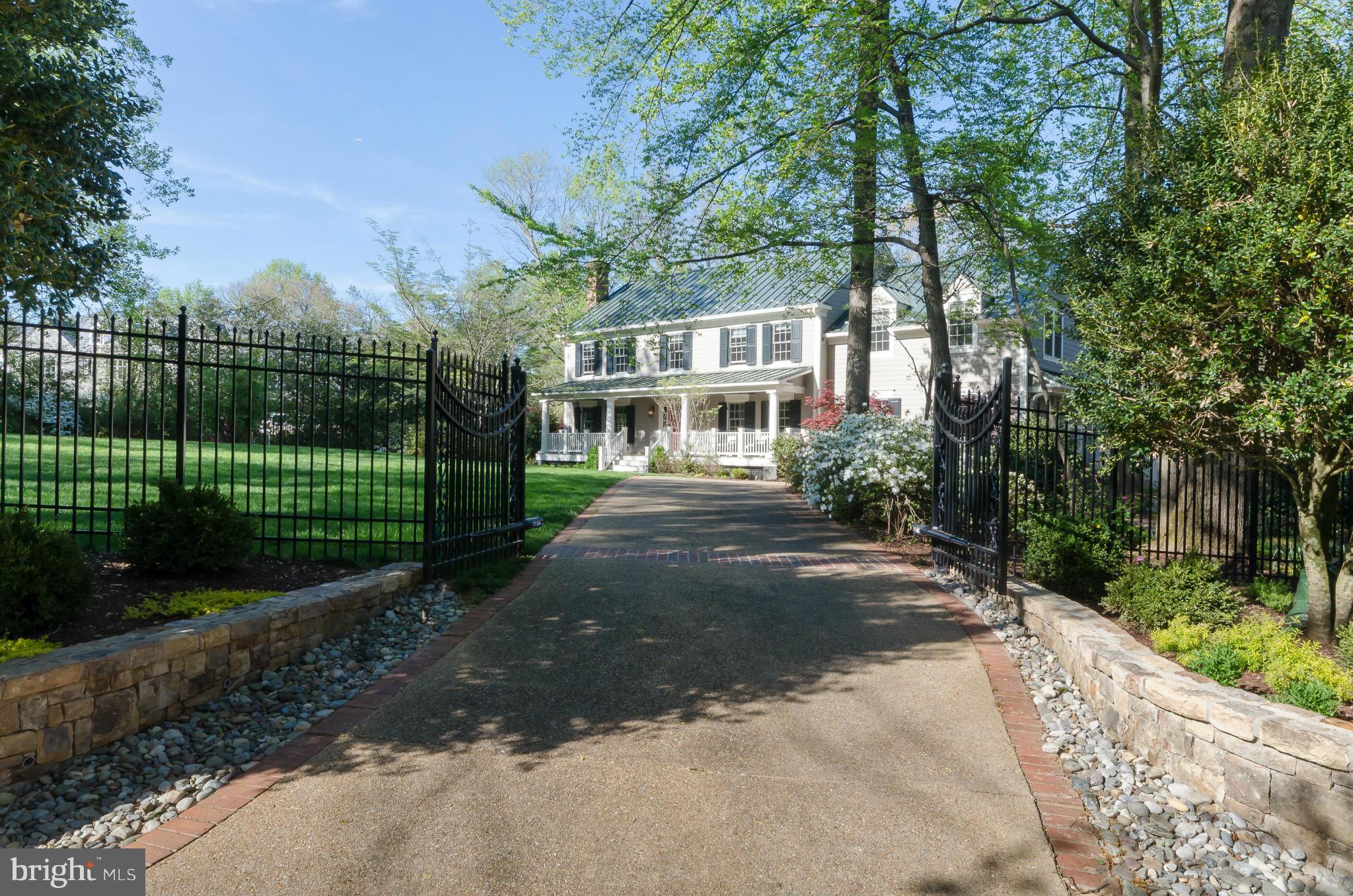 Stunning Stately Home on a Huge Private gated lot. Newly Renovated. Large room sizes. Custom paint scheme. 2 Fireplaces. beautiful lighting package. Amazing upper level laundry. Closet Organization systems. Finished lower level. Heated Pool. Fire pit . Built in outdoor grill. 2 car garage. Circular Drive.