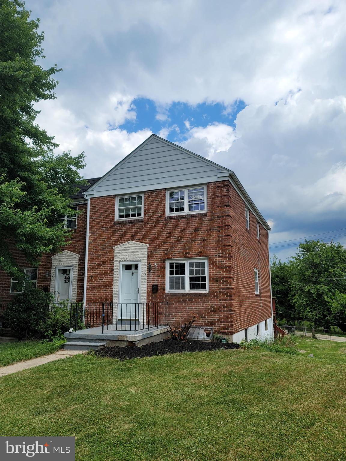 Welcome home to this stunning end-of-group townhome. Hardwood floors greet you as you enter the bright and airy main level. The spacious floor plan features 3 good sized bedrooms and 2 full bathrooms. Downstairs, the fully finished basement offers the perfect space for a family room, home office, or gym. Step outside to your expansive, rare-sized yard—ideal for outdoor entertaining, gardening, or playtime. Enjoy the added privacy and extra windows that only an end-unit can provide. Do not miss the opportunity to make this beautiful property your own!