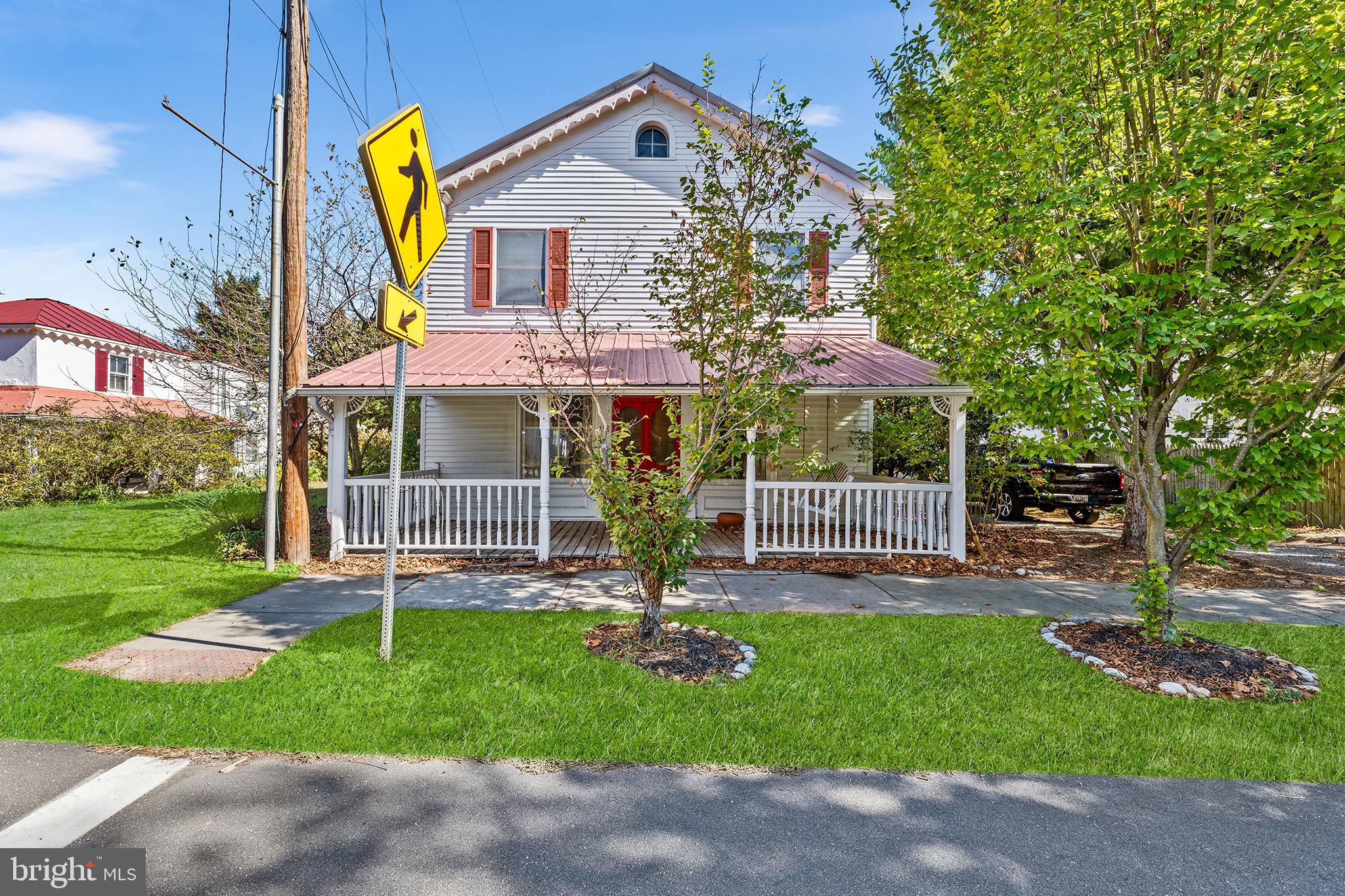 Discover the potential of this lovingly maintained and charming waterfront home with breathtaking views of the Chester River. Nestled in the quaint community of Crumpton MD this 1890 built Victorian home features 4 bedroom, 3 full baths and a .38 acre setting with 70 ft. of waterfront offering unobstructed views of the Chester River and endless possibilities for customization and personalization. This home greets you with a welcoming covered front porch, perfect for enjoying your morning coffee or relaxing in the evenings. Step inside and enter into a the warm and inviting living and dining room featuring a cozy fireplace, built-in bookcases, and beautiful hardwoods, making it the perfect setting for both relaxation and entertainment. As you head towards the kitchen, you will find a main level full bath, dedicated laundry room with ample storage, and under the stair storage. The kitchen has been updated with newer cabinetry, stainless appliances, center island with breakfast bar allowing ample seating and luxury vinyl plank flooring, providing a good starting point for additional renovations. The family room is adjacent to the kitchen and features exposed beams and slider doors that open to spacious back deck offering captivating views of the Chester River. Designed with accessibility in mind, this home includes a side door screened porch entrance into the kitchen with a gently sloping ramp. Travel upstairs where you will find hardwood flooring, and 4 well appointed bedrooms. The primary owner’s suite features exposed beams and ample space with a full bath located just outside of the master bedroom for convenience and privacy. The 3 spacious secondary room share a separate full hall bath. This home offers breathtaking outdoor views that can be fully appreciated from the spacious deck. Whether you're enjoying a quiet morning coffee or hosting an evening gathering, the deck provides the perfect spot to relax and take in the stunning scenery. This home features a newer HVAC system and metal roof. This home is waiting for its new owner to add personal touches and take it to the next chapter of its life. Whether you’re looking to maintain its historic charm or infuse it with modern design, the choice is yours! This home’s location in Crumpton, MD provides the perfect balance of peaceful living and accessibility. With close proximity to Route 301, Chestertown MD, Delaware and commuting to the Bay Bridge, Crumpton is the ideal location. Enjoy the benefits of living near key travel routes without sacrificing the charm of small-town life. Don’t miss out on this unique waterfront opportunity!