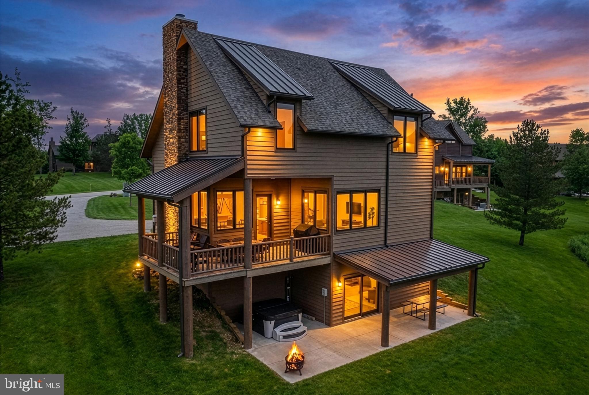 Newly built in 2023, this stunning  5-bedroom, 5.5 bath mountain retreat with a Class 2 membership in the DC Highlands community offers the perfect blend of luxury and DCL charm. Designed with both comfort and entertaining in mind, the home features a bright, open-concept layout with soaring windows allowing you to soak in natural light and outdoor scenery,  a floor-to-ceiling stone fireplace, a spacious kitchen, and plenty of space to ensure privacy.

The main living area flows seamlessly to an expansive outdoor deck—ideal for relaxing or hosting—while the lower level provides a secondary gathering space perfect for movie nights & games. A private hot tub enhances the experience, creating a true year-round getaway.

Newer rental with Airbnb - this property offers investment potential while also serving as an exceptional personal retreat. Enjoy low maintenance living thanks to the community managed areas, while also enjoying community seasonal pool, tennis courts, and community lake access.  A scenic setting just minutes from Deep Creek Lake, Wisp Resort, golf, dining, and year-round recreation.