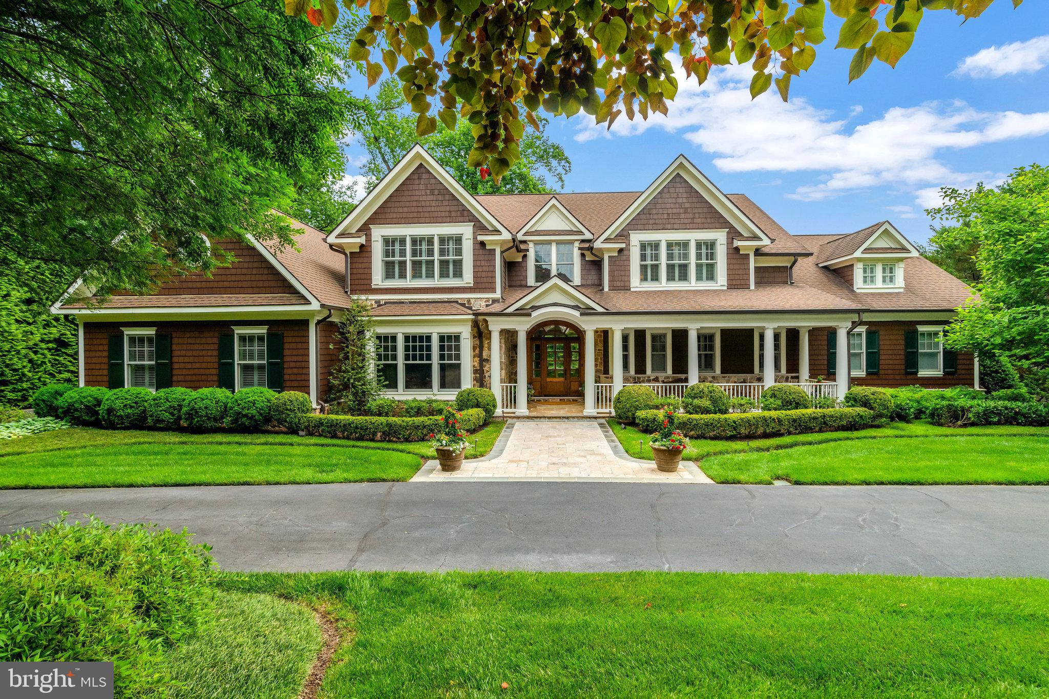 Welcome to an unparalleled masterpiece nestled in the exclusive enclave of Langley Forest, McLean, Virginia. This 6 bedroom 5 Full and 3 half bath rare offering, meticulously crafted by esteemed builder John Joy, epitomizes luxury living at its finest.
Poised on a generous 1.57-acre lot, this distinguished residence boasts impeccable craftsmanship and exquisite architectural details that exude timeless elegance. As you enter, you're greeted by the rich allure of walnut floors, setting the tone for the unparalleled quality found throughout the home.
The main level is designed for effortless living and entertaining, featuring a spacious layout that seamlessly flows from one impeccably appointed space to the next. The centerpiece of the home is the main level primary suite, offering a serene sanctuary where luxury and comfort converge. Pamper yourself in the lavish ensuite bathroom, complete with indulgent amenities and refined finishes.
Ascend the grand staircase or indulge in the convenience of the elevator to discover the upper levels, where additional bedrooms and versatile living areas await. Every corner of this estate has been thoughtfully designed to provide the utmost in comfort and sophistication.
Venture to the walk-out lower level, where endless possibilities await. This expansive space offers the ideal canvas for creating your own entertainment oasis, complete with lower level ceiling heights to accommodate a golf simulator, ensuring endless hours of leisure and recreation for you and your guests.
Outside, the lushly landscaped grounds provide a private retreat where you can relax and unwind amidst the tranquility of nature. Whether you're hosting al fresco gatherings on the expansive patio or screened in porch with fireplace, enjoy a quiet moment of reflection in the meticulously manicured gardens. This estate offers a rare opportunity to experience luxury living at its finest.
Located in the highly coveted Langley Forest neighborhood of McLean, this exceptional property offers the perfect blend of privacy and convenience, with easy access to top-rated Langley, Cooper and Churchill Road schools, shopping, dining, and entertainment options. Don't miss your chance to own a piece of luxury real estate in one of the most sought-after communities in Northern Virginia. If interested, all furnishings are negotiable or may convey.
