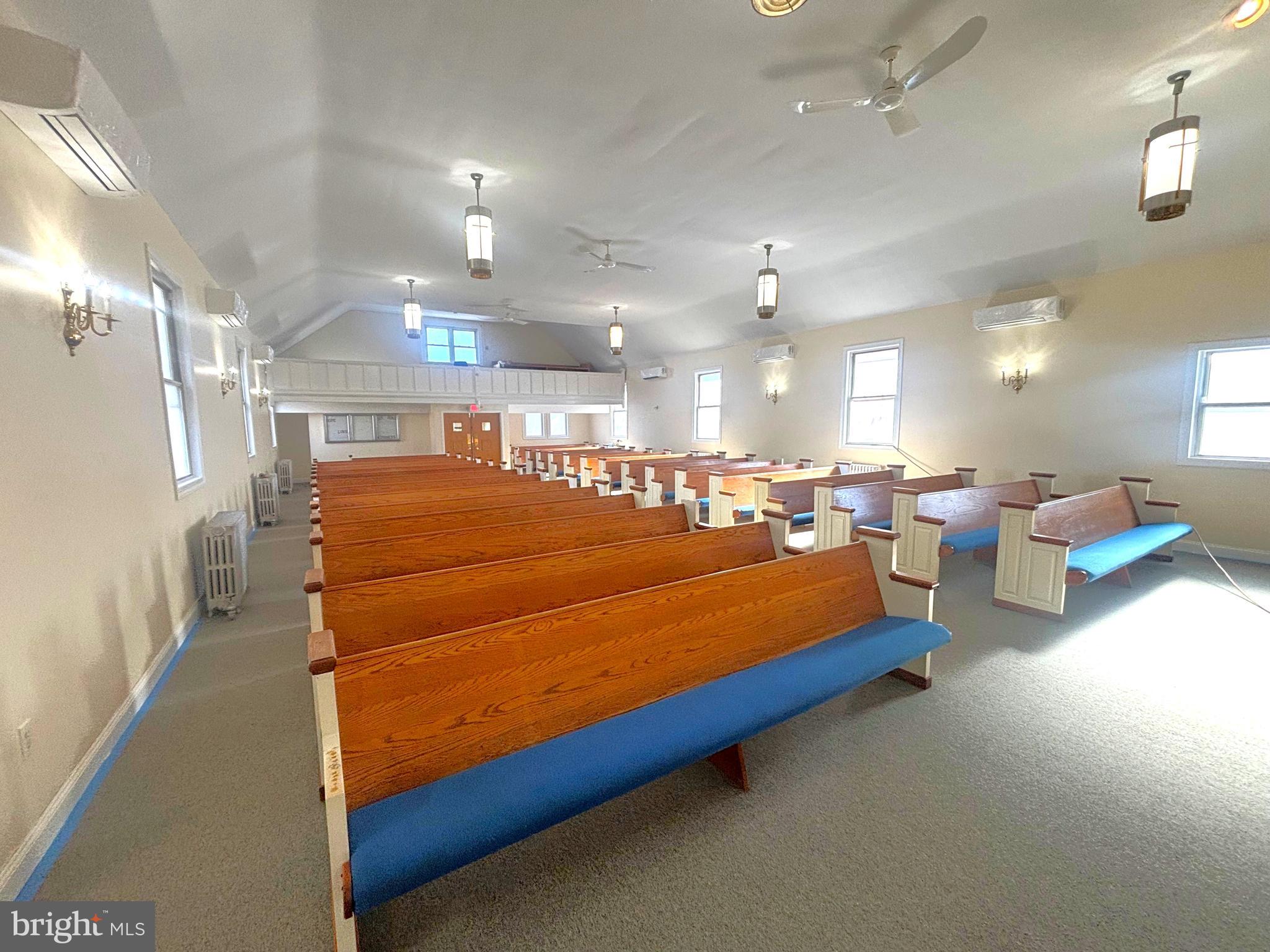 Long a fixture in the community of Allendale in West Baltimore, this worship facility was home for many years to Friendship Baptist, who sold to New Fellowship Bible in 1989, with the most recent owner being Sacred Zion, who purchased the property in 2007 for $725,000.  The seller is looking forward to having a new congregation breathe life into the property and establish a positive presence in the community.  Built in 1928, the "L"-shaped house of worship offers  9672 SF of finished space on two levels.  The sanctuary is located on the upper level, with access from Denison Street.  At one time the sanctuary was configured to seat 400, and in its most recent configuration, it seats 340 in pews, according to fire marshal records.  Newly-carpeted, the sanctuary has a large stage/altar area, a balcony, and new mini-splits for air conditioning.  Also on the upper level is a suite of rooms including restrooms, a large multi-purpose room, two offices, and a space with a viewing window that could be used as a crying room or sound room.  The lower level, which can be accessed from inside and outside includes a surprising amount of space.  There is a large social hall and pastor's office, complete with restroom.  The chapel contains a baptistry, disguised by a removable stage.  The baptistry was not constructed with a proper faucet or drainage, so it will require some modification to be used according to modern specs.  With the chapel is a multi-purpose room that could be used as an office, a crying room or meeting room, along with another restroom, an office/classroom, and a room that had previously been used as a snack bar.   Recent updates to the complex include new paint, carpet, flooring, plumbing, electrical, and HVAC.  The roof is said to have been replaced in 2017.

The building occupies a parcel of ±0.32 acres and includes 91 feet of frontage on W Mulberry and 150 feet on Denison.  There is easy access to the major arteries of Edmondson Ave and N Hilton St.  Street parking is plentiful, and there is paved parking for about 16 vehicles if parked valet style.  

As the building has been recently renovated, the seller intends to make no additional repairs (warranties on new HVAC excluded). The seller makes no representation regarding condition, zoning, or use. Buyers should address any issues during the study period. There is no option to lease the property; it is offered for sale only. 

To view the property, please have your real estate professional request a tour through ShowingTime.  To submit an offer/letter of intent, please request a term sheet.  The seller has its own commercial purchase agreement and its own closing agent.  Title has already been ordered.