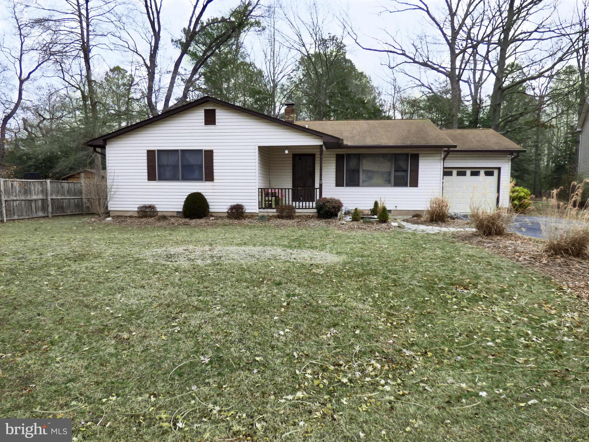 Room to spread out here!  Extra large bedrooms!  This home features a wood burning fireplace, large open family room, back slider opens to your fenced in back yard (great for your dog) complete with fire pit, shed for extra storage, slate patio with gas grill, beautiful landscaping (not so much in winter) with garden pond and sitting room on front porch.