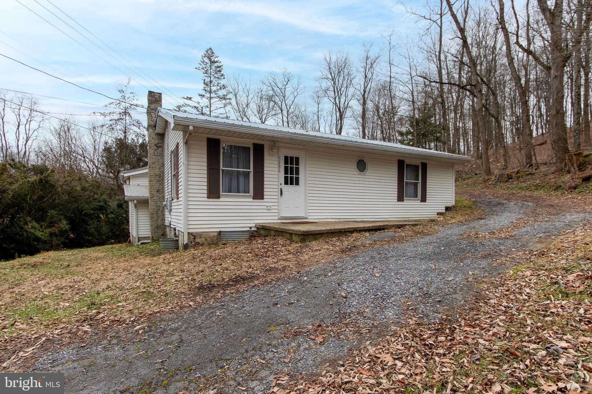 Why rent?  This 2 bedroom, 1.5 bath home has all your big ticket items covered - new metal roof, new septic system and new kitchen, just to name a few of the updates done to this easy to manage 1,000 sf home in the State College Area School District.  This charming ranch style home sits on 2.89 wooded acres that could be hiked by the adventurous and has a small stream that fronts the property adding additional character to the landscape.  Why rent or live in an apartment in State College when you can own a great starter home or secluded getaway just 8 miles from Beaver Stadium?  Also close to the beloved amenities on the northside of State College - Wegmans, Target, Starbucks and more.  Call to see this sweet little home today!