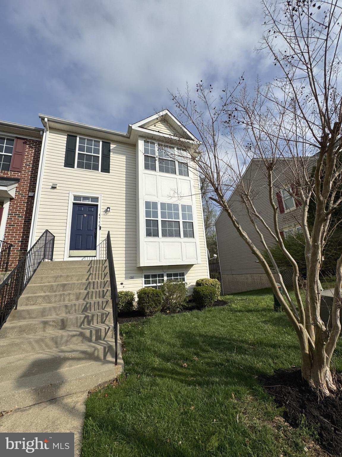 Discover the perfect blend of comfort, style, and convenience in this stunning end-unit townhome in the highly sought-after Vista Gardens community. Boasting a scenic view and abundant natural light, this home offers the privacy of an end unit paired with an open, spacious floorplan ideal for both relaxing and entertaining. Step into the beautifully updated kitchen, where quartz countertops, shaker-style cabinets, and stainless-steel appliances create a modern and functional cooking space. Engineered hardwood flooring on the main level adds warmth and elegance, flowing seamlessly into the dining area with access to a large wood deck — perfect for morning coffee or evening sunsets. Upstairs, you'll find three generous bedrooms and two full bathrooms, including a sun-filled primary suite featuring a state-of-the-art bathroom with elegant fixtures — designed to feel like your own private sanctuary. A main-level powder room adds convenience for guests. The walk-out basement includes a spacious recreation room, a full bathroom, and additional unfinished space — ideal for a gym, home office, or guest suite. Enjoy direct backyard access from the basement, perfect for seamless indoor-outdoor living. Don’t miss your chance to own this beautifully maintained home in one of the area’s most desirable communities. Schedule your private tour today!