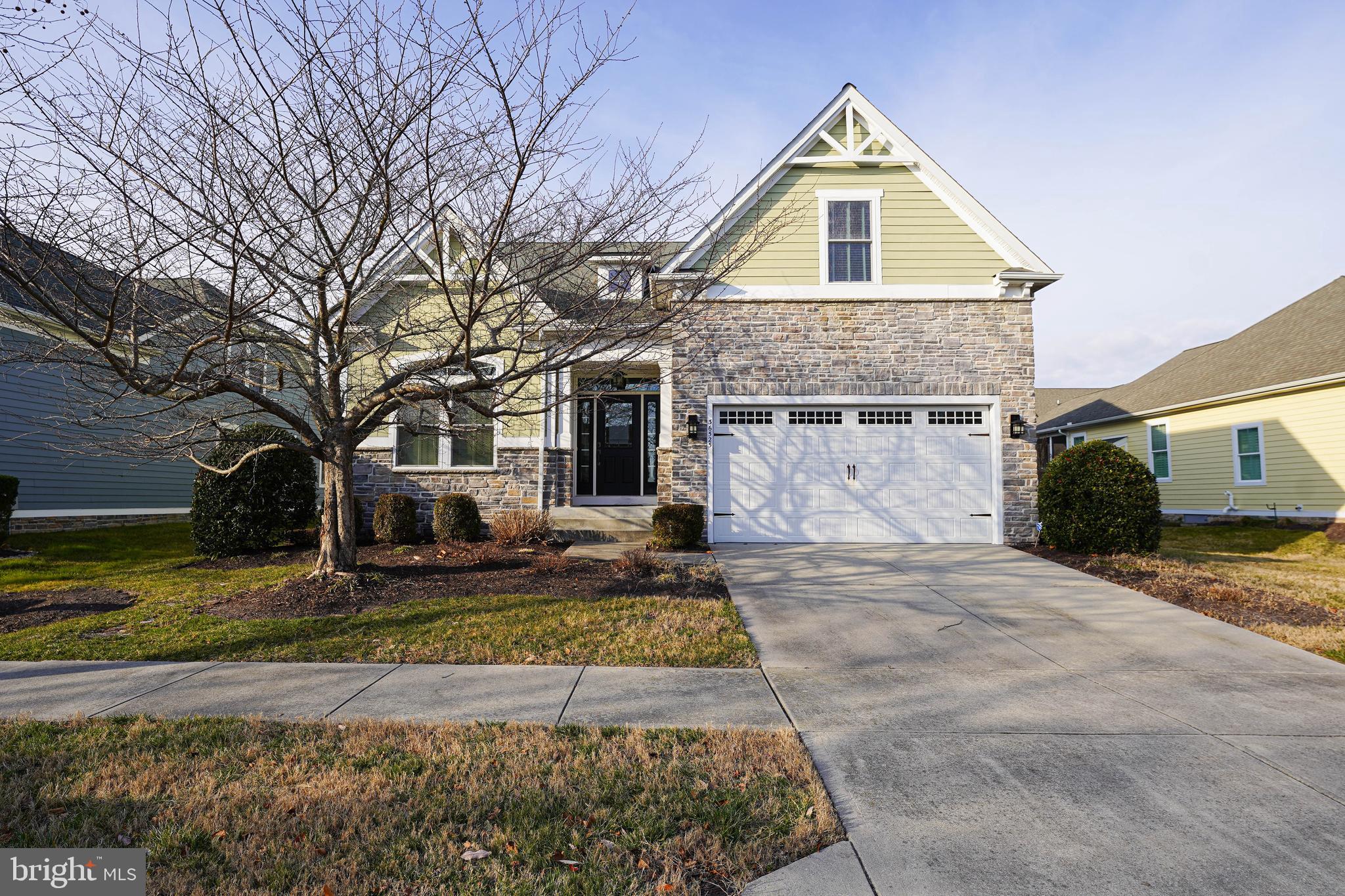 Offering true main-level living with coastal elegance, this beautifully maintained home is nestled in the highly sought-after Bayside community of Selbyville, Delaware. Designed for both comfort and entertaining, the home features a spacious open floor plan, refined architectural details, and inviting indoor and outdoor living spaces.
Step inside to find light-filled living areas accented by tasteful finishes and a relaxed coastal palette. The heart of the home is the open kitchen, complete with an oversized center island, stainless steel appliances, ample cabinetry, and seamless flow into the great room—perfect for everyday living or hosting guests. The adjacent formal dining space adds an elegant touch for special gatherings.
The main-level primary suite serves as a private retreat, featuring a generous walk-in closet and a spa-inspired ensuite bath with dual vanities and a beautifully appointed walk-in shower. Additional bedrooms on the main level provide flexibility for guests or family, while an upper-level living area with an extra bedroom and full bath offers ideal space for visitors, a home office, or multi-generational living.
Outdoor living is equally impressive, with a screened porch and hardscaped patio creating the perfect setting for relaxing evenings or entertaining year-round. The home has been meticulously cared for and thoughtfully designed to maximize both function and comfort.
Bayside offers an unmatched lifestyle with resort-style amenities including pools, golf, fitness facilities, walking and biking trails, dining, live entertainment, and more—all just minutes from the beaches. Whether you’re seeking a full-time residence or a coastal retreat, this home delivers the perfect blend of luxury, convenience, and community.
Live where every day feels like a getaway—welcome to the Bayside lifestyle.