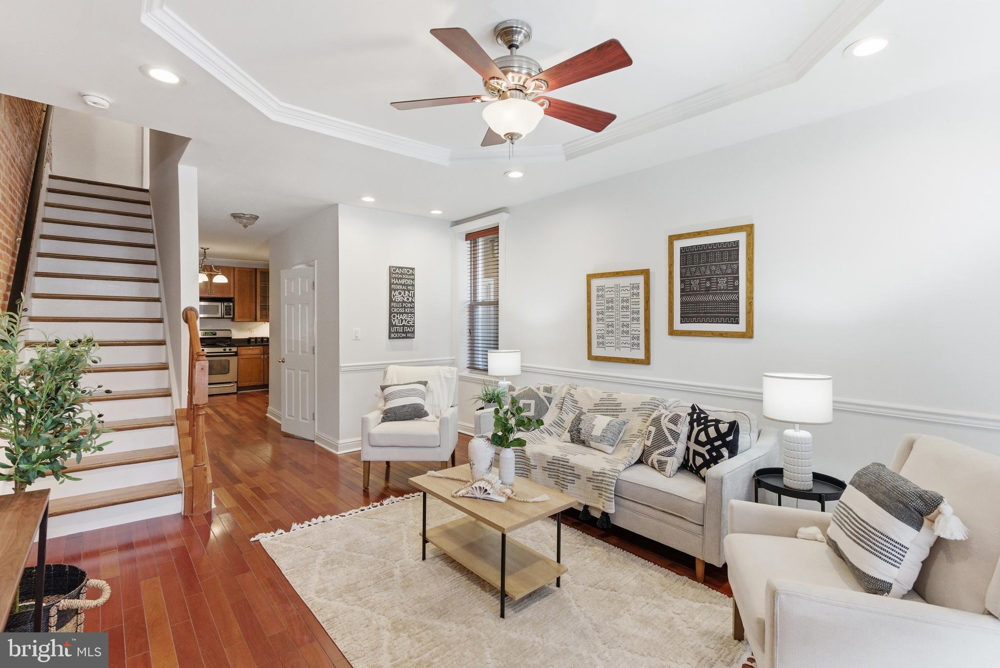 Welcome to 11 E. Ostend Street. This remarkable home is situated on one of the best blocks, in one of the most desirable sections of Federal Hill. Easy access to 95, 295 and points north and south of the city.  Enjoy this unique and functional layout featuring a large living room, expansive kitchen, separate dining room and 1st floor powder room. Enjoy the side deck just off of the dining room, perfect for outdoor entertaining or alfresco dining. The large basement is perfect  storage and easily accessible from the kitchen. This home boast 3 bedrooms and 3.5 baths. The 3 en-suite bedrooms make for a great roommate layout or convenient guest stays. Home has many updates including the HVAC system that was replaced in 2025, and the water heater in 2024. Freshly painted with all new recessed lighting. Wood floors, granite counters and stainless appliances finish off this Federal Hill classic. The rooftop deck is being sold "AS IS", seller will consider a credit for the deck with acceptable offer.