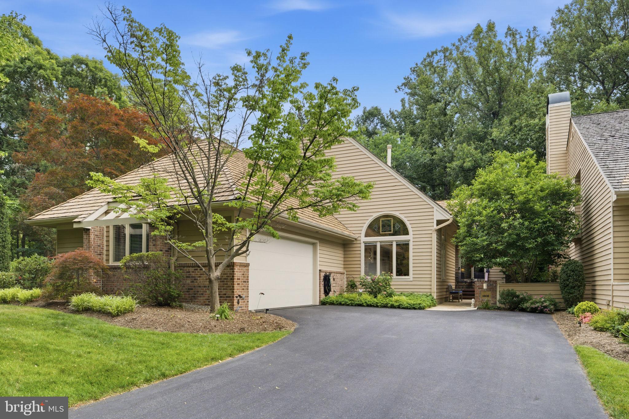 This exceptional 4-bedroom, 2.5-bath single-family home with a two-car garage is nestled in the highly sought-after North Reston neighborhood. Home offers an abundance of natural light thanks to spectacular soaring windows and skylights that beautifully frame the outdoors. Step inside to find gleaming main-level hardwood floors, an expansive open living and dining area ideal for entertaining, and an upgraded kitchen featuring granite counters, white cabinetry, a large center island, stainless steel appliances, and under-cabinet lighting. The cozy family room boasts a gas fireplace and sliding glass doors leading to a private deck with serene wooded views. The spacious primary suite includes a vaulted ceiling, generous walk-in closet, and a luxurious en-suite bath with a glass shower. A second main-level bedroom (or home office) offers French door entry for added privacy. The fully finished walk-out lower level features a recreation room with a wet bar, a third spacious bedroom and yet another room that could be used as a bedroom, studio, home gym, or other purpose; all light-filled and airy. Beyond its stunning interior, this home sits in an unbeatable location. Enjoy year-round Reston amenities including miles of walking trails, pools, parks, and tennis courts, plus the vibrant Reston Town Center with its shops, restaurants, ice skating rink, summer arts festivals, and endless cultural events. Commuting is effortless with easy access to Dulles Airport, Tysons Corner, the Beltway, and the Reston Metro—connecting you to all of the DMV. Gorgeous inside and out, in a location that truly delivers the Reston lifestyle—this is a rare opportunity not to be missed.