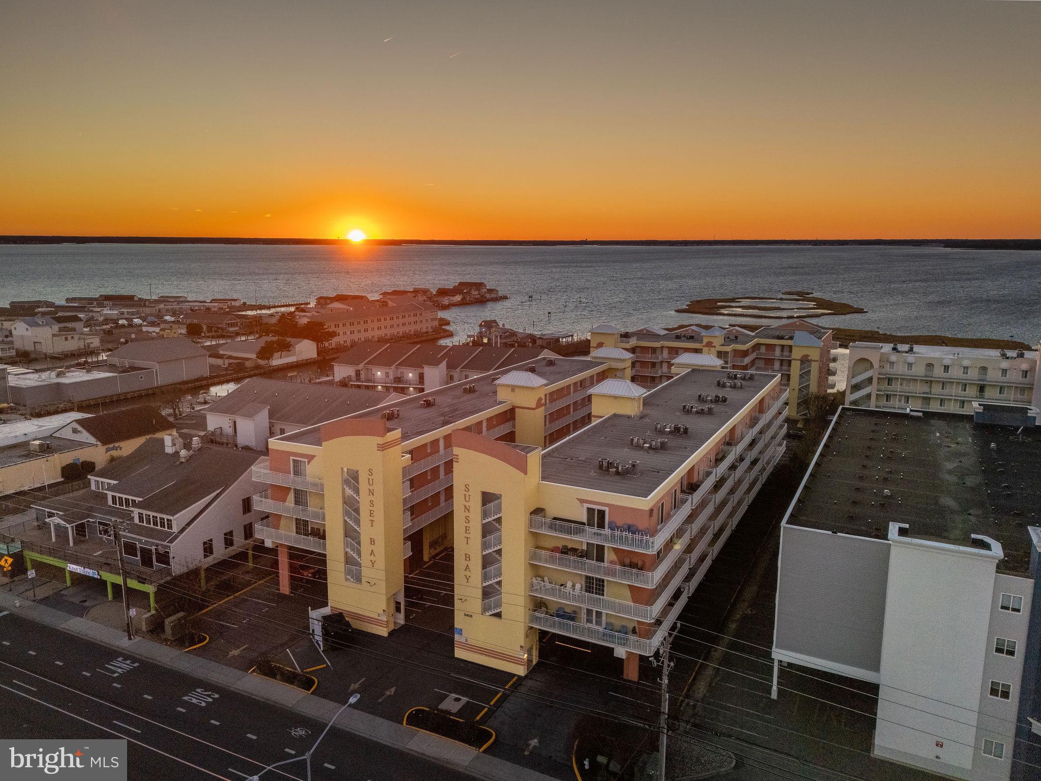 OPEN HOUSE SATURDAY June 27th & SUNDAY JUNE 28th 11:00 AM-1PM  
MOTIVATED SELLER - Price Improvement!!! Come check out this condo!!   DON'T MISS OUT  THIS CONDO IS IN THE MIDDLE OF EVERYTHING!!! CAPTURE THE SPRING  & SUMMER FUN AND SETTLE THIS PROPERTY NOW!!! 
Imagine this:  A breathtaking Western sunset over the Bay, washing away all your cares & concerns from the past week! 5405 Coastal Highway #406 includes a 2 Bedroom 2 Bath home that brings the outdoors in! From the living room, dining space or OWNERS SUITE enjoy the wrap around private balcony with elevated views of a Bayside retreat! 
You’ll feel like you’re living in a dream! Your day begins with a 1 block stroll to the beach then finishing the afternoon being spoiled taking the salt air down a notch at the pool! DEEP SEA FISHING, CRABBING, enjoying AMUSEMENT PARKS or AN EVENING CONCERT at the OCEAN CITY INLET!
Location, location, location… This home is right in the heart of FUN! Don't forget OUTLET SHOPPING right around the corner!!
54th Street is  blocks from the RT 90 & RT 50 Bridge! Great spot to HELP CELEBRATE Ringing in the NEW YEAR… 2026… Help our country kick off 250 Years of FOUNDING OUR COUNTRY with an amazing New Years Fireworks, Saint Patrick’s Day Parade, Memorial Day, Fourth Of July Extravaganza, then Labor Day including numerous weekend concerts, car shows and specialty Sun & Fall Festivals. This 2 Bedroom 2 Bath home is sold furnished and can comfortably sleeps 6-8 people with GREAT RENTAL HISTORY from Nov. 2018 - Dec. 2024
Recent updates include: 
New Refrigerator (2020),HVAC Unit (2021),Dining Room Table & Chairs 2022, Living Room Furniture (2022), New Luxury LVP Flooring (2023), Microwave (2025)  
Don’t forget Fitness Center for weights and cardio room too! Keep your Bike, Paddle Board or Kayak in the designated areas for a small fee for the season!
So, what are you waiting for? Come and experience the best of both worlds: the thrill of living in a beautiful home and the best location! Don’t miss out on this incredible opportunity! This home has 2 elevators that take you  to your next home!!!