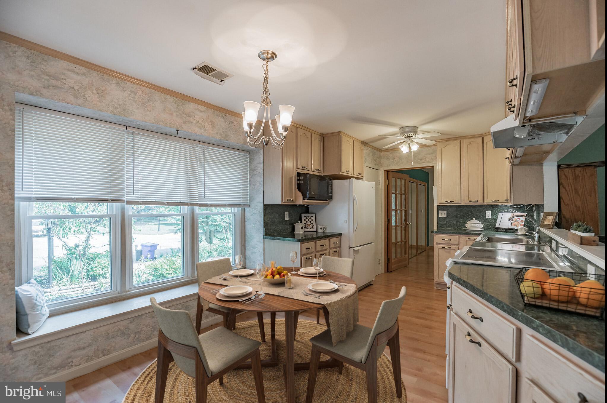 ***HIGHEST AND BEST OFFERS DUE BY  11:00am MONDAY 7/26/2021***

Welcome to 3131 Flanders Court.  This adorable rambler is full of charm!  Tucked back behind gorgeous garden beds and brick pathways, and surrounded by trees - this one is a hidden gem for sure!  3 large bedrooms (one with an en suite half bath) and a huge full bathroom laid out beautifully with room to stretch out.  The kitchen is open with plenty of cabinet and counter space, and room for a large dining set.  Curl up on the couch in the living room in front of the fire and watch the birds through the huge wall of sliding doors.  If the inside space isn't enough, the outdoors features a large deck and screened porch, 2 large sheds, and level yard space with a playset.  2 built-in "Murphy Beds" convey (one on the screened porch, one in a bedroom) makes this a great space for company or multiuse spaces.  Home and sheds sold AS-IS/WHERE-IS