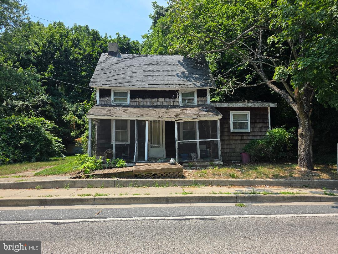 INVESTORS ALERT! This home is in need of a major renovation or a tear down. There is a basement foundation to this home. The rear of the home has suffered severe water damage. PLEASE EXCERCISE EXTREME CAUTION INSIDE AND OUTSIDE OF THIS PROPERTY. The vehicles will be removed from the prior to settlement.