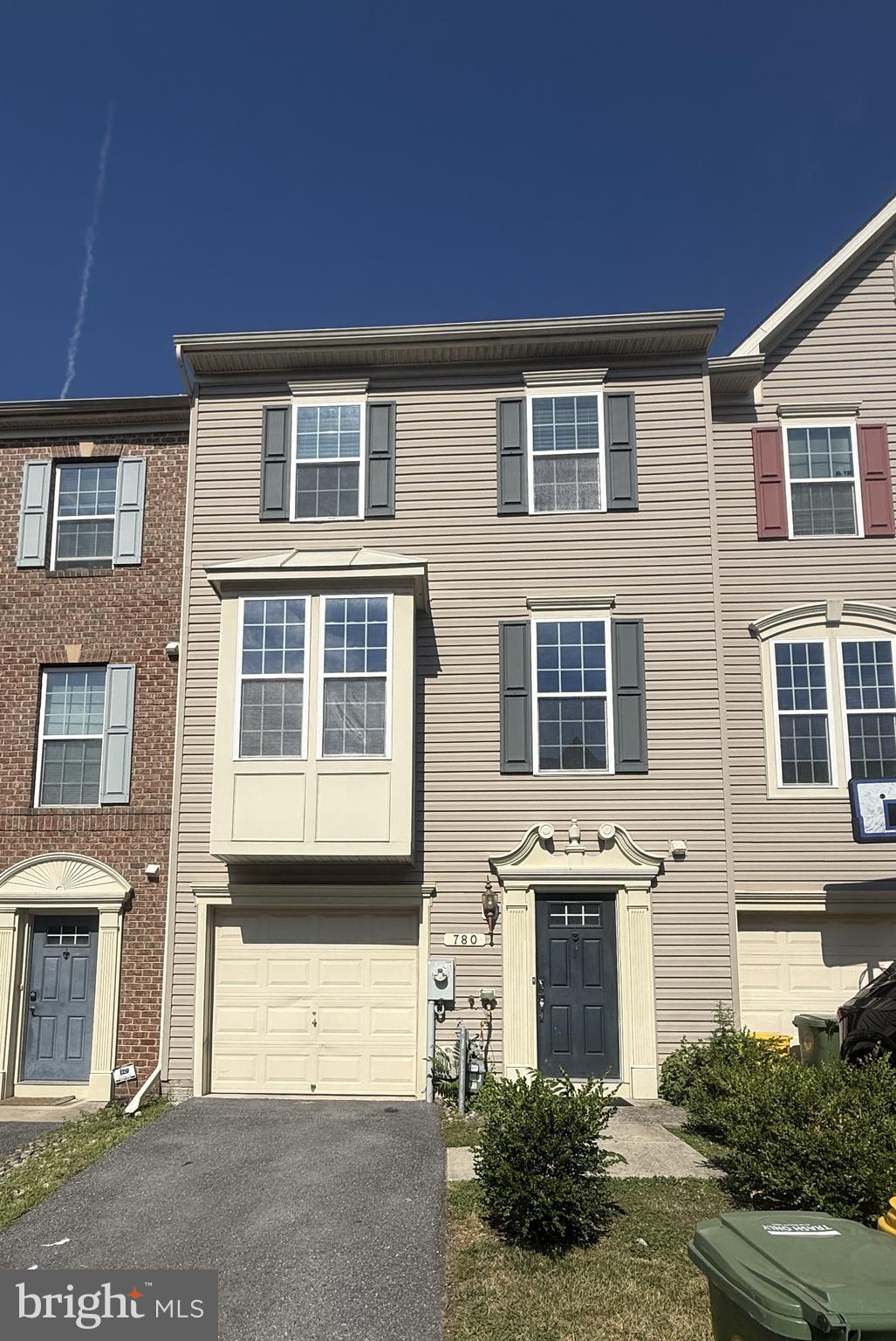 Updated HVAC, fresh modern paint, and completely carpet-free! Welcome to this beautifully maintained, turn-key 3-story townhome in Pine Ridge Crossing, offering nearly 2,000 square feet of bright, seamless living space. The main level boasts a wide-open layout with durable, low-maintenance flooring flowing effortlessly from the spacious living area into an eat-in kitchen—perfect for entertaining. Upstairs, find tranquil bedrooms filled with natural light, alongside immaculate full baths. Enjoy the convenience of an attached garage, a private driveway, and a backyard transition ready for outdoor enjoyment. Located just minutes from major commuter routes, Ft. Meade, and local shopping, this home combines suburban peace with effortless urban access. Schedule your tour today—move-in ready with young mechanicals already in place!