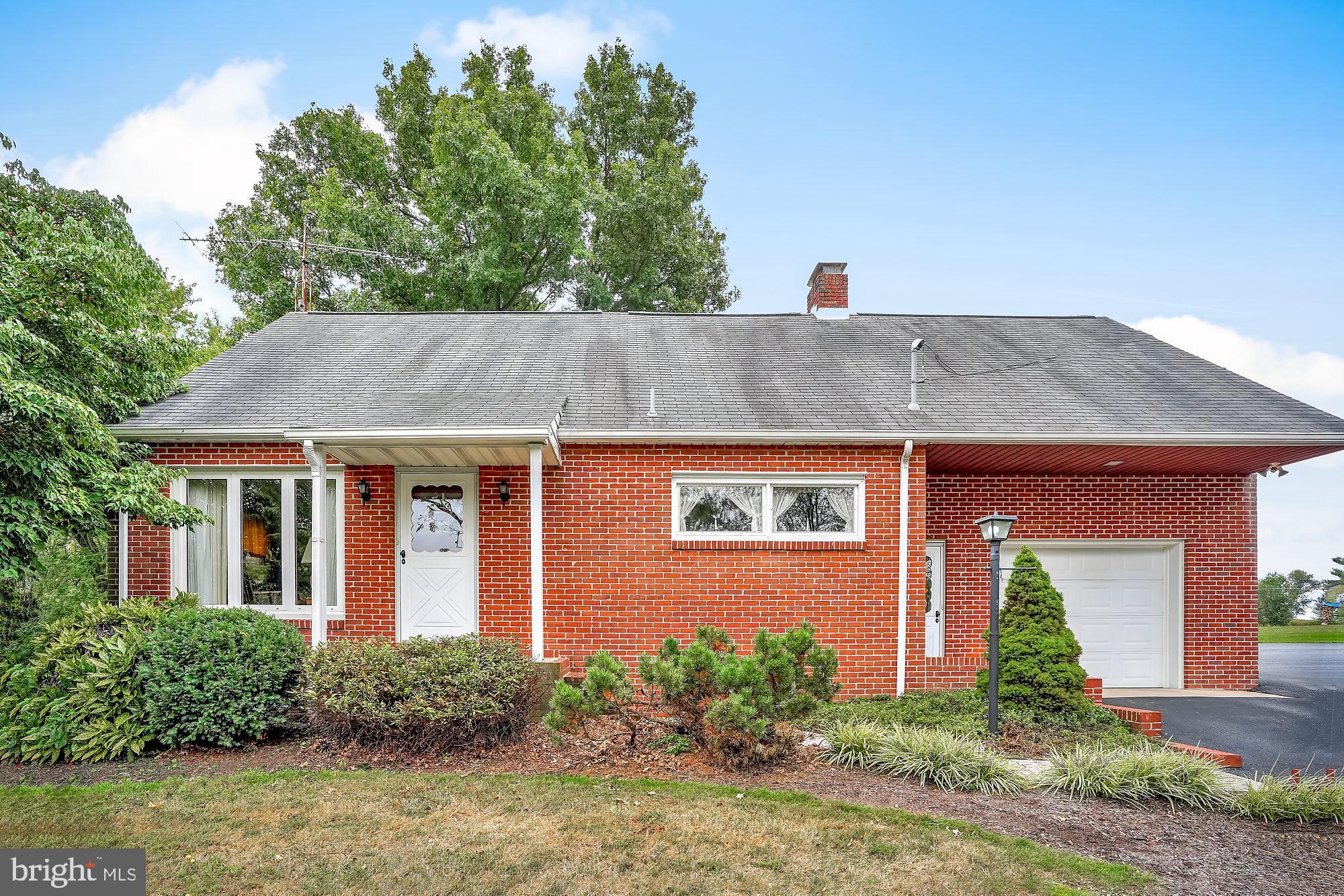 Brick Cape Cod located on a beautiful 1.5 acre lot.  This home was built by the current owner and shows pride of ownership.  Enjoy the spacious yard, covered porch and three season sunroom.  There is also an out building located to the rear of the property for those who like to tinker.  The fireplace is now gas but at onetime used wood.