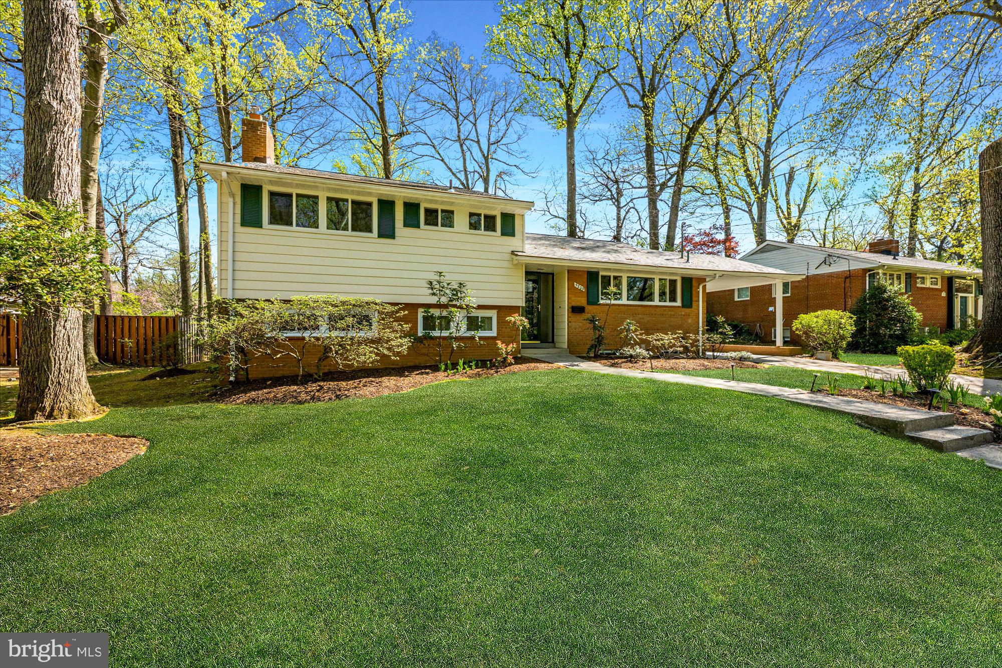 Pristine 3 bedroom (plus den), 3 full bathroom home in coveted Wildwood Manor. Completely renovated, including new roof, windows, HVAC, water heater, kitchen, primary bathroom, refinished wood floors and freshly painted through-out. This inviting property features a sun-filled living room open to the gourmet kitchen and perfectly situated dining room. The large family room has a fireplace and steps out to the extraordinary level backyard with patio. The den can be used as a guest suite or home office. Upstairs features the primary suite with updated bathroom, as well as two large, bright bedrooms and a full hall bathroom. Oversized lower level storage, private driveway and carport. Walk to all Wildwood Shopping Center has to offer including restaurants, grocers, cafes and retail shopping. Grovesnor Metro less than 1 miles away, easy commuter access to both 495 and 270, plus Bethesda Trolley Trail, many local parks, YMCA, and Montgomery Mall. Walter Johnson Cluster.