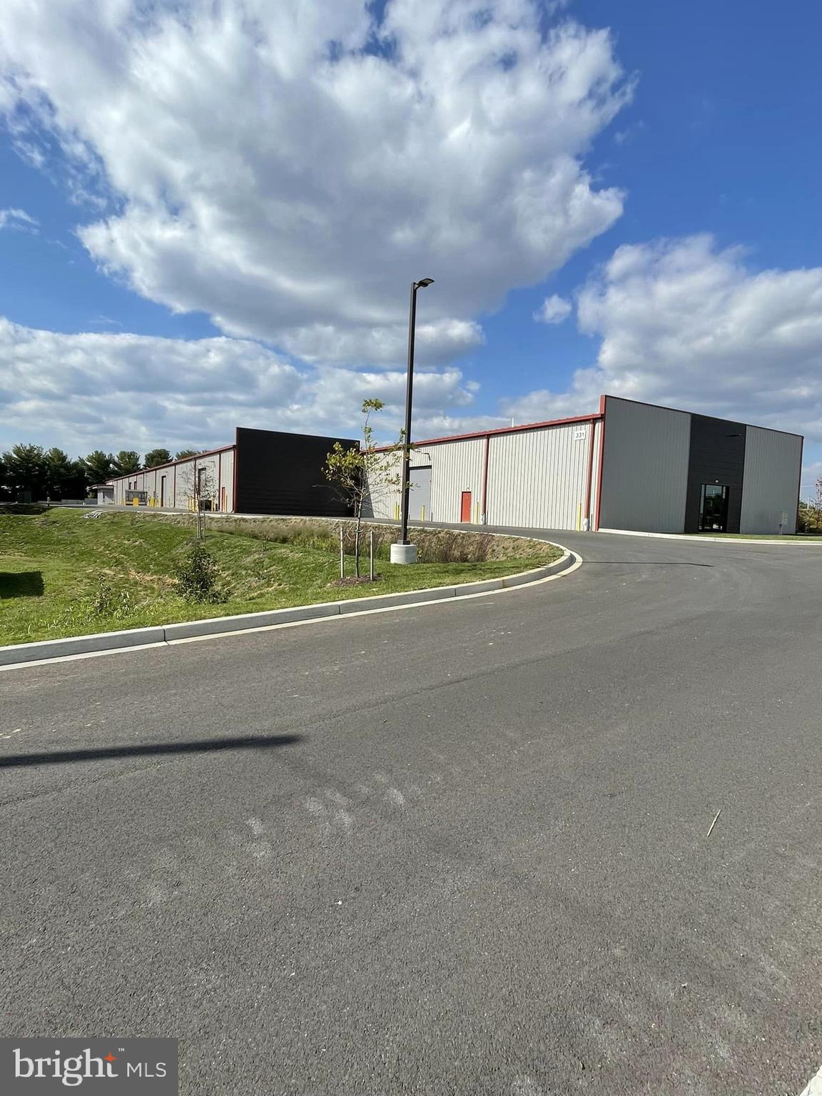 PRICE ESTIMATE for Cold Dark Shell - 331 Aviation Way is a Sprinklered Condominium Building with PRICE ESTIMATE for Cold Dark Shell - 331 Aviation Way is a Condominium Building with 55,002 SF.  
One Unit with 13,780 SF @ $14 + NNN ($3.41 PSF) Can Be Subdivided.
Restrooms are not installed as the owner is waiting to see where future tenant wants the location of it.
The Site totals 4.66 Acres and is Zoned M1 (Light Industrial) and located in the (AO) Airport Overlay Zone.  Located Across from Frederick Airport.