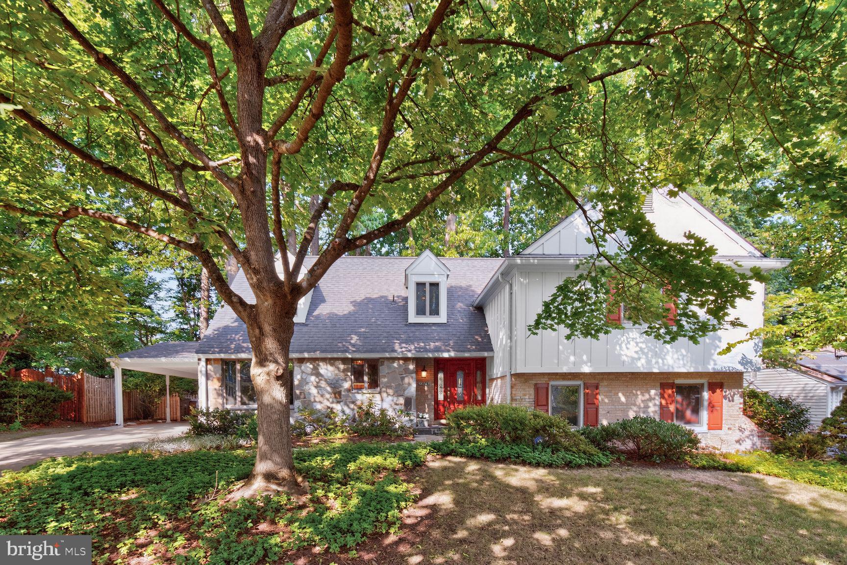 Step inside 1988 Lancashire Drive and you’ll immediately feel the care and attention that has been poured into every corner of this meticulously maintained Potomac Woods residence. This isn't your standard colonial; the unique five-level layout offers a sense of flow and discovery that makes everyday living feel a bit more special.
The main level invites you in with a formal step-down living room anchored by an expansive picture window that floods the space with natural light. Whether you’re hosting a dinner in the formal dining room or enjoying a casual morning in the country kitchen, the connection to the outdoors is seamless. Slide open the glass doors to find what might be the home’s most captivating feature: an enchanting backyard oasis. With multi-level flagstone patios with  stone walls, built in gas grill,  and charming  fountain, this outdoor space is a private sanctuary designed for entertaining ,family enjoymrnt or quiet reflection.
As you explore the different levels, the versatility of the home shines. The lower level features a fabulous family room with brand new carpet, wood burning fireplace, sliding glass door to rear patio, powder room, and laundry/storage room with brand new flooring. The additional basement level features a large recreation room and utility room with new flooring and provides plenty of room for a gym, hobby space, home office, or storage. On the first upper level, three spacious bedrooms offer plenty of comfort, including two with direct access to a charming wraparound balcony. The crown jewel is the private primary suite located on its own level. This expansive retreat feels like a world of its own, boasting cozy window seats, brand-new carpeting, and custom closets. The renovated spa bath is a showstopper, featuring a separate shower and deep soaking tub that invites you to unwind at the end of the day.
Located just minutes from the vibrant shopping and dining hubs of Potomac, as well as easy access to I-270 and Falls Rd, this home perfectly balances a tranquil lifestyle with suburban convenience. It is just a fifteen minute walk to Starbucks, Harris Teeter, shopping, and restaurants in Potomac Woods Plaza. It’s a quick walk to Potomac Woods Swim  and Tennis  Club  and Potomac Woods Park. It’s rare to find a property that feels this tucked away while being so close to everything you need. Welcome home!
