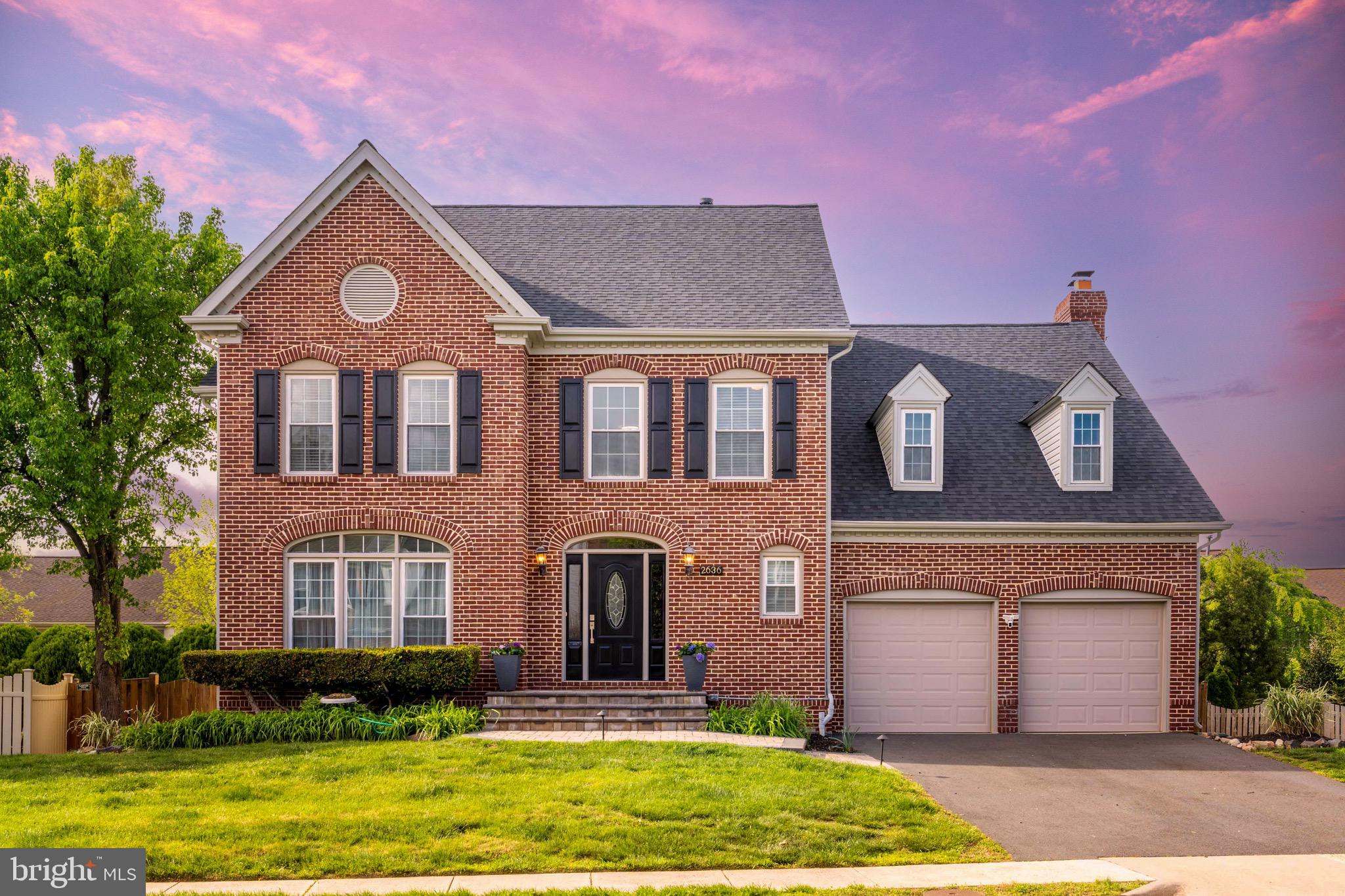 Offers received. Offer deadline is 12 o'clock noon on Monday, April 28th. Welcome to 2636 Meadow Hall Drive – a stunning brick front colonial in Herndon’s sought-after Meadow Hall neighborhood. This spacious three-level colonial offers over 4,600 sq. ft. of finished living space, featuring a welcoming two-story foyer and gleaming hardwood floors throughout. The updated kitchen is a true standout, with custom cabinetry, brand-new quartz countertops, a custom tile backsplash, a new cooktop, dishwasher, stainless steel appliances, recessed lighting, and ample storage space. The main level also includes a formal living room and dining room, a bright and airy home office, an updated powder room, and a large laundry room with a brand new washer and dryer. The inviting family room, complete with a gas fireplace, opens to a screened-in porch and deck, perfect for entertaining, with a fully fenced yard and hardscape patio featuring a fire pit. On the upper level, you’ll find three generously sized guest bedrooms, an updated hall bath, and a spacious owner’s suite with two walk-in closets, a cozy fireplace, and a beautifully renovated en suite bathroom. The walk-up lower level features a massive recreation room, a full bath, a wet bar with a wine fridge, and an abundance of storage space in the mechanical room. Recent upgrades include a new roof (2022), a new hot water heater (2021), a renovated kitchen (2024), newer siding (2016), and fully renovated bathrooms (2022/2023). Additionally, there’s a brand-new washer and dryer (2025), fresh paint throughout (2025), and a new front walkway with exterior lighting and landscaping (2023). The upper bedroom carpets were replaced in 2021. This home is located within the highly rated Fairfax County School District, zoned for Floris Elementary, Carson Middle, and South Lakes High School. It’s also conveniently located near Dulles International Airport, metro and bus stops, and major commuter routes including Fairfax County Parkway, the toll road, and Route 28. The vibrant Herndon community offers a wide variety of events, including the farmers market, fireworks, and the popular ‘Friday Night Live’ summer concert series. This home offers the perfect blend of privacy and accessibility.