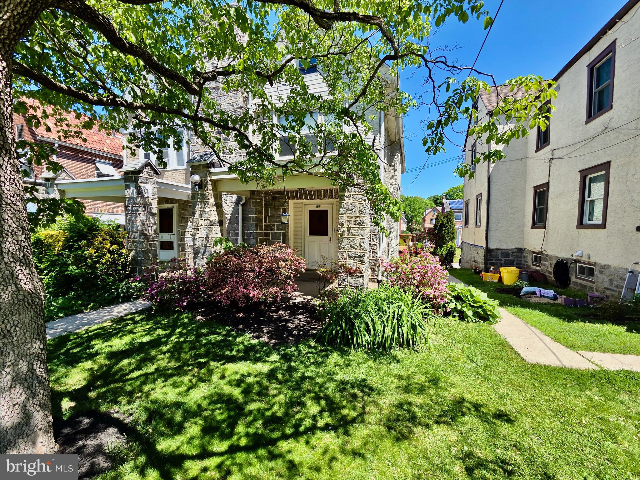 Welcome to 41 Wayne Ave, a twin home with classic character. This 3 bedroom home is graced with many flowering bushes and trees for beauty and shade. The covered front porch sets an inviting tone as it greets you and your guests. Step inside to a cozy living room with wood burning fireplace. From the living room is the formal dining room for both every day living and entertaining. Beyond the dining room is the spacious eat-in kitchen with door to the oversized deck, perfect for relaxing or hosting gatherings. The second floor offers 3 comfortable bedrooms and a hall bath. Need more space, the unfinished walk up attic with built in closet, offers excellent potential for an additional bedroom or flexible living space. Included in the home is the 1 car garage, great for parking or added storage with a back door into the home. Many updates include- new roofs, both flat and shingle 2026, New electric (no more knob and tube), New dishwasher and new basement windows. Schedule your showing today!