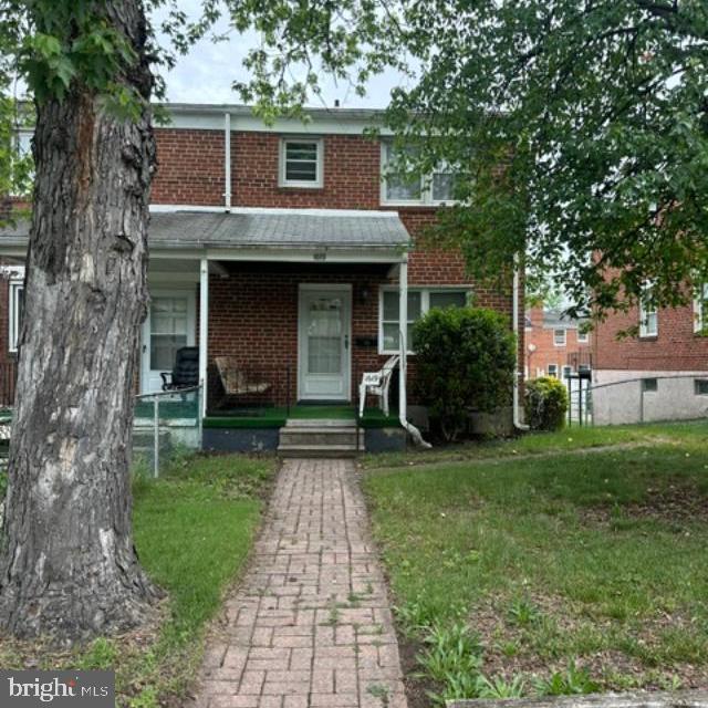 WELCOME HOME!  Well loved family home full of opportunity for it's new owners.  This charming brick exterior end of group rowhome features an updated kitchen and bathroom.  The HVAC is only 2 years young with the balance of a 10 year transferrable warranty ready for the next owner.  The main level is a welcoming gathering space featuring hardwood floors in the living area, dining area, and continuing to the second floor.  From the kitchen, you can walkout to a classic Baltimore style iron porch overlooking the fenced back yard and shared alley.  On the second floor you will find 3 bedrooms and an updated full bathroom.  The partially finished basement has lots of potential for additional living space.  Conveniently located near public transportation and commuter routes, come see this one before it's gone!