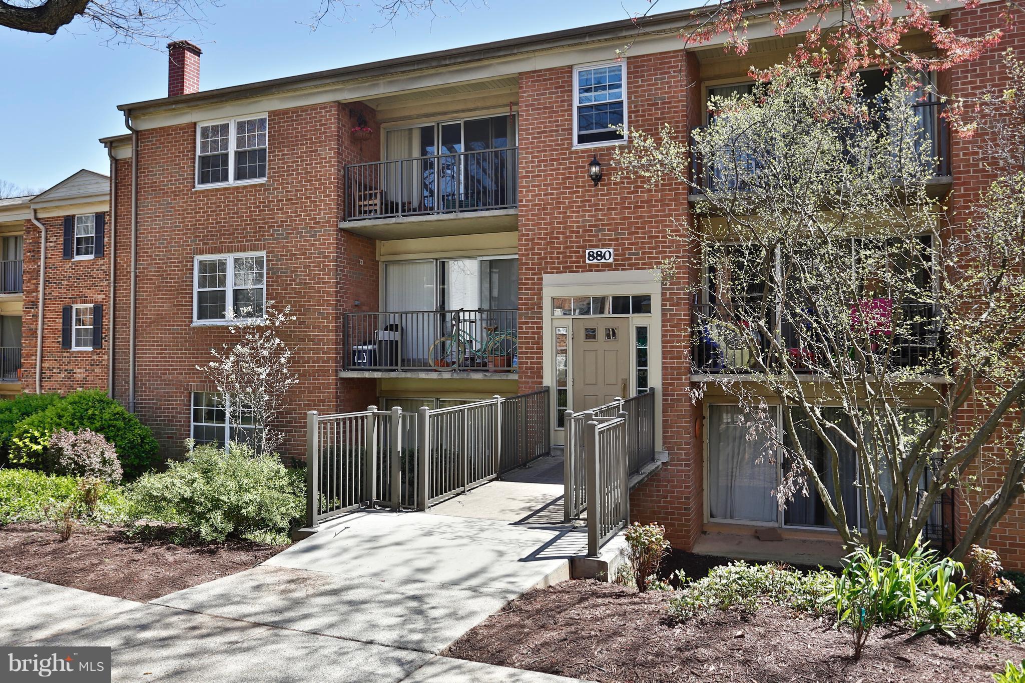 Enjoy nature from your own balcony - property backs to parkland. Awesome location close to Rockville town center, metro and a block to ride-on! There are very few units of this model in PW! Bright, spacious, clean & elegant condo w/remodeled kitchen, one full & 1/2  BA, gas cooking & heat (included in low condo fee), HW floors throughout. Coin-free laundry. Unlimited parking & great pool!