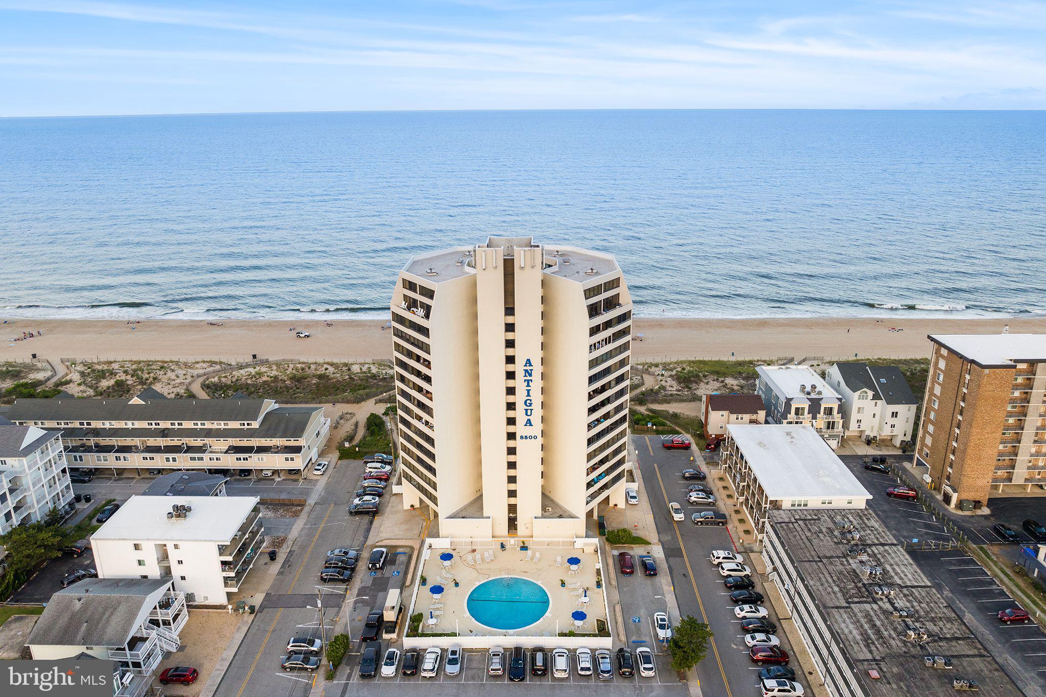 Experience coastal living from new heights in the sought-after Antigua building. This 11th-floor oceanfront condo boasts a coveted southern exposure, capturing sweeping views of the Atlantic Ocean, Assawoman Bay, and the Ocean City skyline.

Inside, you’ll find a beautifully updated two-bedroom, two-bath layout with a bright, open design that blends comfort and style. The kitchen flows effortlessly into the living and dining areas, creating an inviting space for entertaining or unwinding after a day by the water. Floor-to-ceiling sliding doors fill the home with natural light and open to a private balcony—perfect for enjoying ocean breezes and breathtaking sunrises. The primary suite offers a peaceful retreat, complete with automatic shades and stunning coastal views.

Antigua offers a host of amenities, including a heated outdoor pool, sauna, picnic area, secure lobby, on-site management, ample parking, and elevators for convenience. Whether you're looking for a personal getaway, full-time residence, or investment opportunity, this is an exceptional chance to enjoy the best of Ocean City living.