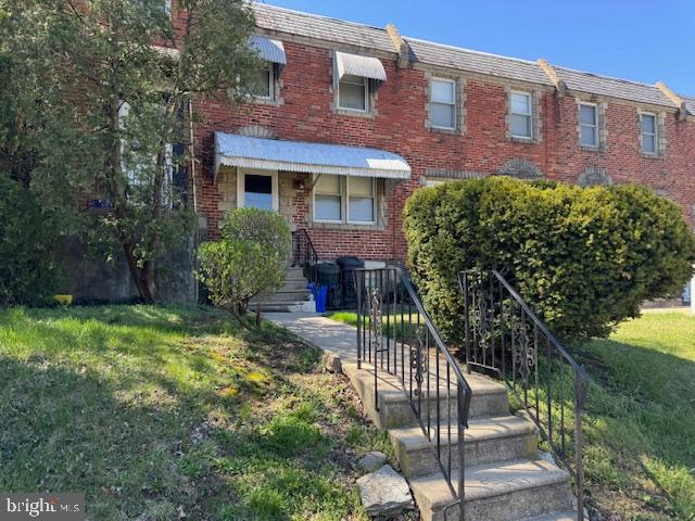 Living room, Dining room,  large eat-in kitchen. Entrance to finished basement with newer central air and heater. Rear storage garage, Washer, dryer. Rear entrance to walk out basement and driveway with parking.
Second floor: Two large  bedrooms, a large tile bathroom, and ample closets.
