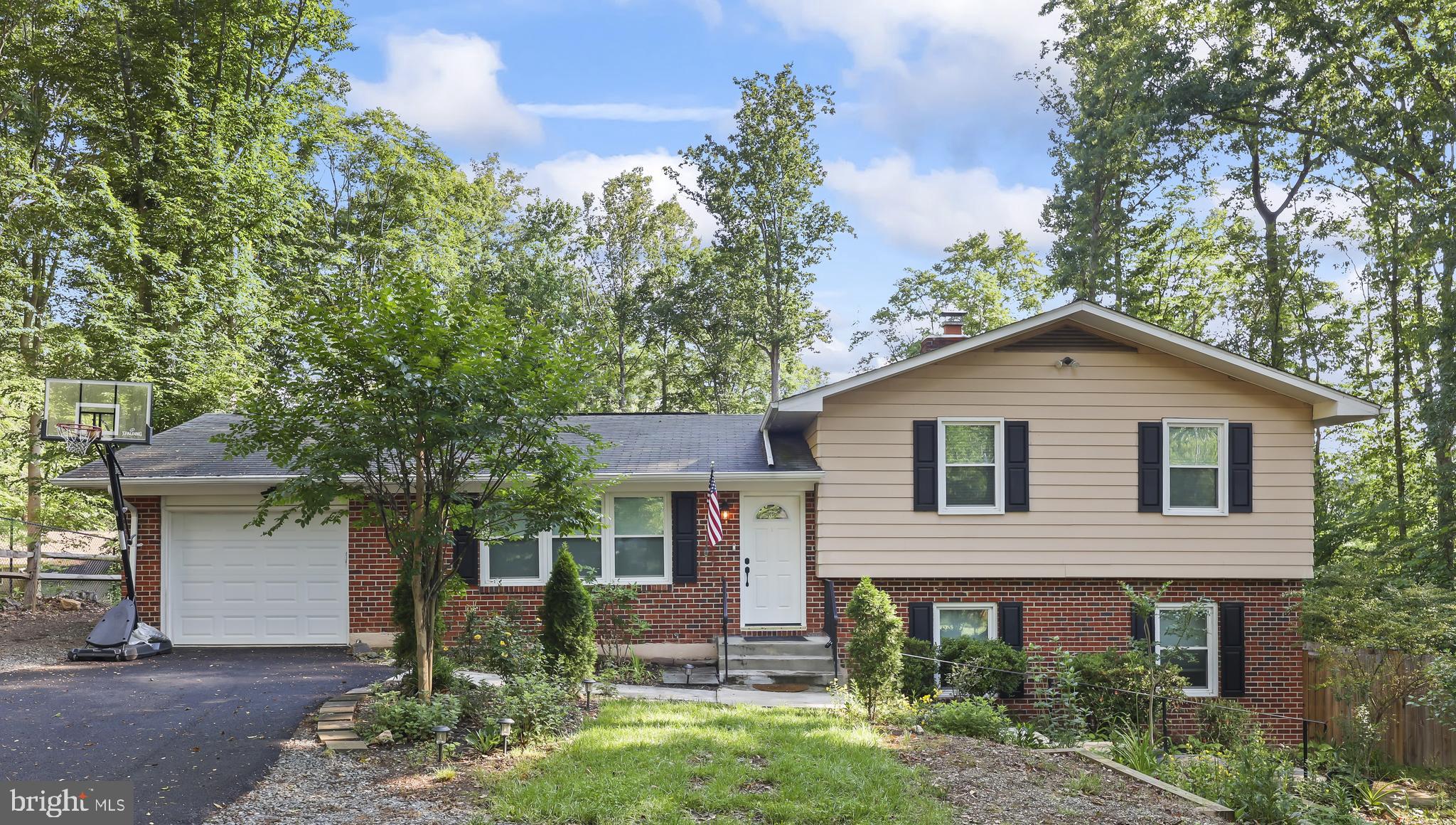 Welcome home to the sought-after Aquia Harbour community! Nestled on a private and beautifully landscaped ½-acre lot, this charming newly renovated split-level home offers peace, privacy and convenience. Setback far from the road, this home provides a quiet retreat you’ll appreciate every day.



 A newly paved blacktop driveway and mature landscaping create wonderful curb appeal. The spacious backyard features a storage shed and a privacy fence — perfect for entertaining, pets, gardening, and play. 



Inside, you’ll love the fresh modern paint colors and the all-new carpet throughout the home. The bright front living room showcases a large picture window overlooking the front yard, filling the space with natural light. The kitchen features new stainless steel appliances and adjoins the dining area for easy everyday living and entertaining. 



Upstairs offers 3 spacious bedrooms with ample closet space. The finished walk-out basement expands your living space with a large rec room featuring picturesque high ceilings and a new fireplace— ideal for cozy Virginia winters! A third full bathroom in the basement adds extra convenience. 



Enjoy living just a short walk to the neighborhood pool, tennis courts, and the harbour, with all the incredible amenities Aquia Harbour has to offer! This location also offers quick access to various commuting options including the VRE, I-95 and Route 1. Add in endless nearby shopping and dining, and you have the perfect place to call home.



You don't want to miss this!