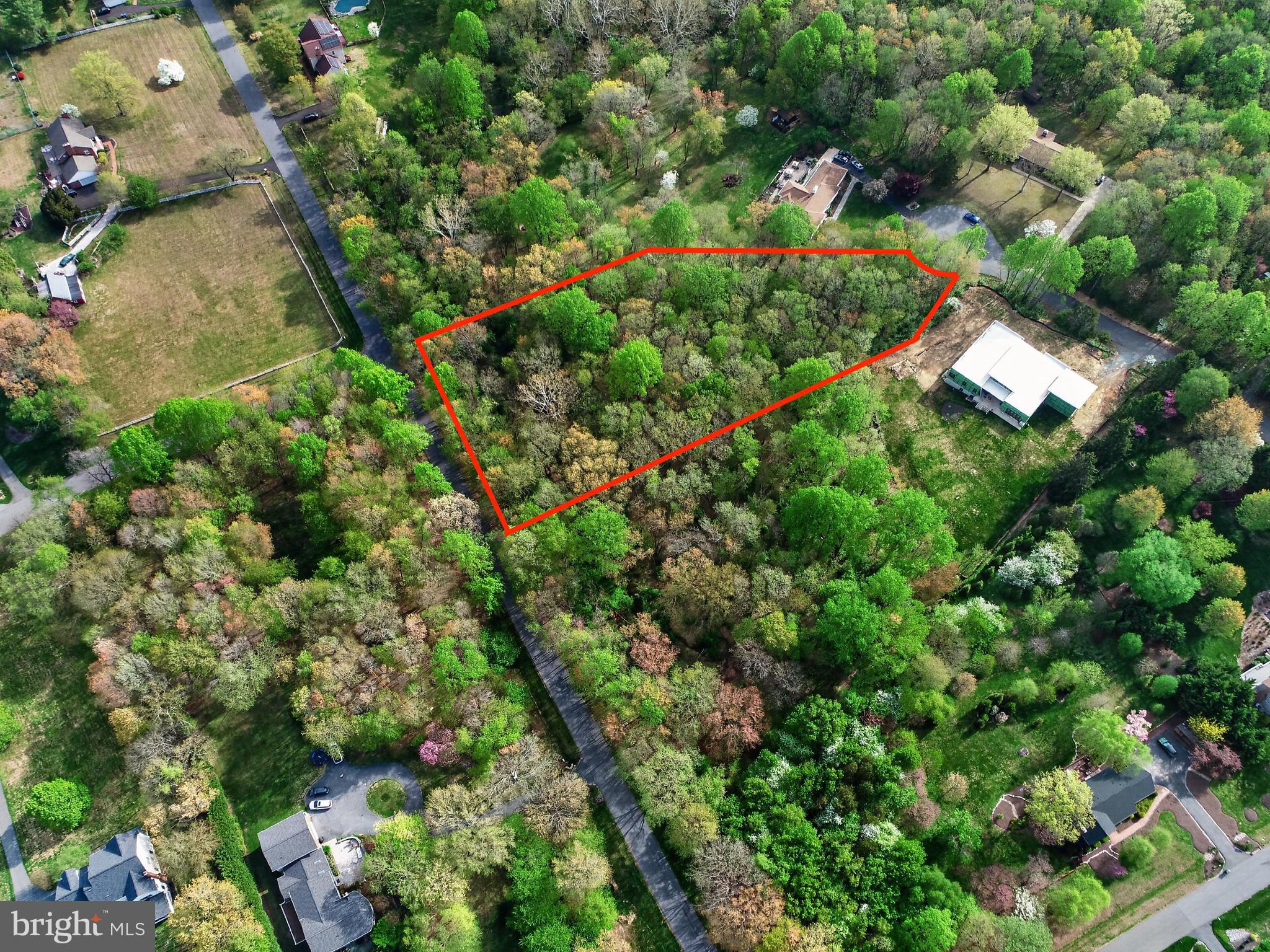 This exceptional 2-acre homesite is perfectly nestled on a quiet cul-de-sac in the highly sought-after Seneca Highlands community.  Nearby new construction homes with comparable acreage have sold in the $1.5M-$2.2M range. Multiple surveys and PERC testing are complete, including approval for a septic system supporting up to 6 bedrooms. Plus, enjoy the rare advantage of public water access and no HOA. Surrounded by peaceful wooded views and featuring a babbling brook at the rear of the lot, this picturesque setting offers the ideal backdrop to custom build your dream home.  Ideally located for both convenience and recreation, the property is just moments from the Darnestown Swim & Racquet Club and Darnestown Local Park, which features sports courts and open green space. Less than a mile to everyday essentials at Harris Teeter, while the vibrant shopping, dining, and entertainment options of downtown Kentlands are just a short 10-minute drive away. Commuters will appreciate the easy access to Darnestown Road (Rt 28), Seneca Road (Rt 112), and I-270, making it easy to enjoy a private retreat without sacrificing convenience. Beginning with the 2027-28 school year, assigned schools will be Darnestown ES, Kingsview MS, and Poolesville HS (verify with school board).