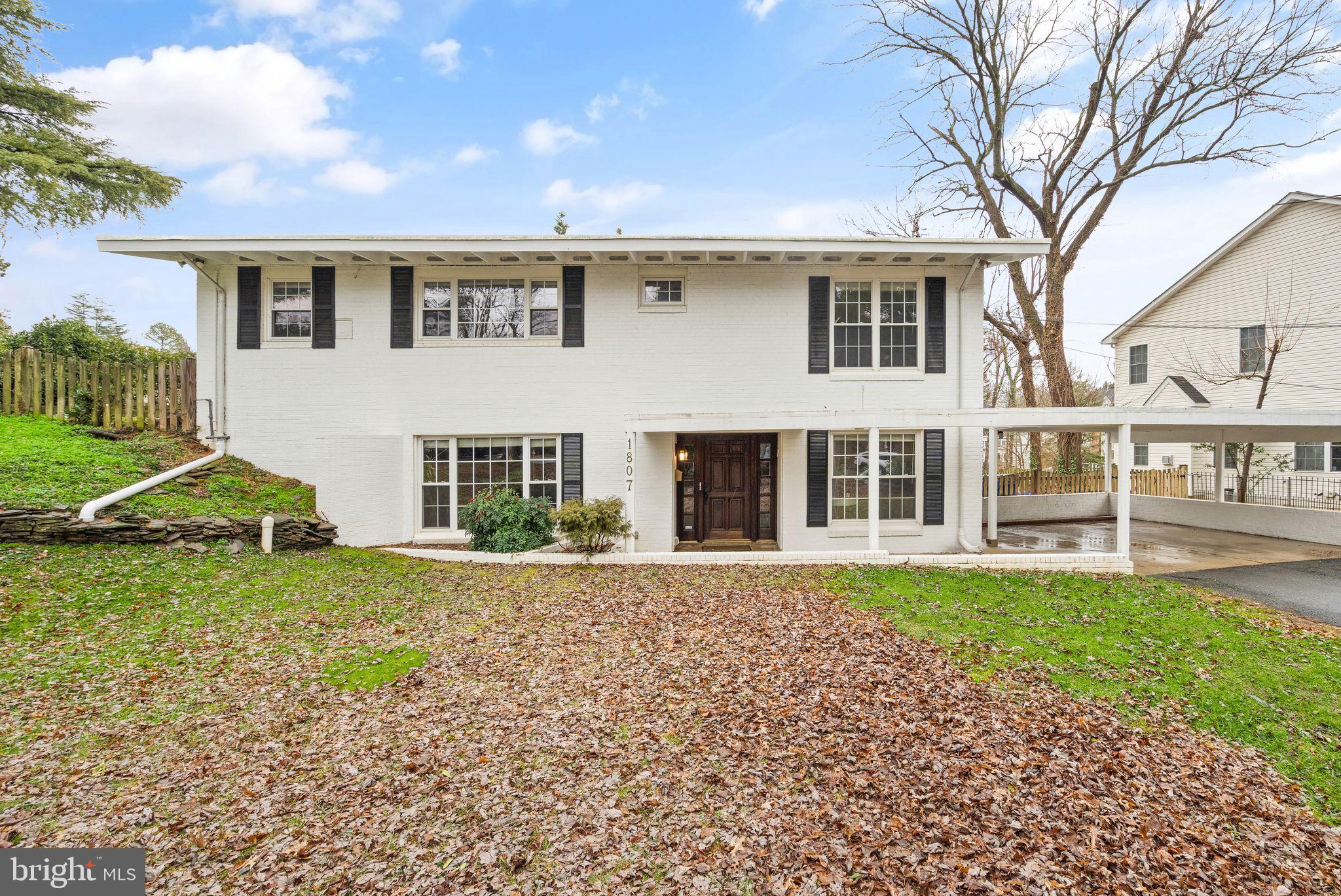 Welcome to Grass Ridge, a suburban haven in McLean, 22101! This charming bi-level single-family home offers a perfect blend of comfort and style. As you enter, you are greeted by a spacious rec room featuring a warm wood-burning fireplace, a den, and a full bath—a perfect space for relaxation and entertainment.

Head upstairs to discover a large modern concept kitchen/living area adorned with vaulted ceilings and wood floors. The living area boasts a second wood-burning fireplace, creating a cozy ambiance. The kitchen is a chef's dream, with sleek black granite countertops, white cabinetry, stainless steel appliances, and recessed lighting—perfect for culinary enthusiasts.

The primary bedroom with a full bath and, two additional bedrooms with a shared hall bath complete the upper level. Step outside to a large deck overlooking a beautiful backyard, complete with a quaint little shed—ideal for outdoor gatherings and enjoying nature.

Grass Ridge is a close-knit community of around 100 homes, nestled between Westmoreland and Old Dominion, north of Kirby Road. The neighborhood borders Kent Gardens Park, offering scenic trails and Pimmit Run, providing a serene "away from the big city" feel despite its proximity to Downtown McLean, Arlington, and Falls Church.

Kent Gardens Recreation Club is a nearby gem for recreational activities. Downtown McLean offers a plethora of options, from dining at Pulcinella Italian Host to grabbing a quick lunch at Sweetgreen or Sweet Leaf Café. For a more formal dining experience, explore Capri Ristorante Italiano or J. Gilberts. Grocery shopping is convenient with Giant Food, Balducci’s, and The Organic Butcher nearby.

Venture into Arlington, where Lee Heights Shopping Center houses the delightful Pastries by Randolph for a sweet treat. Falls Church, known for its friendly atmosphere, hosts a Saturday farmers market and offers biking opportunities with access to the W&OD trail at the end of Westmoreland Street.

Whether you're drawn to the tranquility of Grass Ridge, the amenities of Downtown McLean, the culinary delights in Arlington, or the charm of Falls Church, this home is your gateway to a vibrant and well-connected community. Don't miss the chance to make this bi-level beauty your own!

Property sold as is