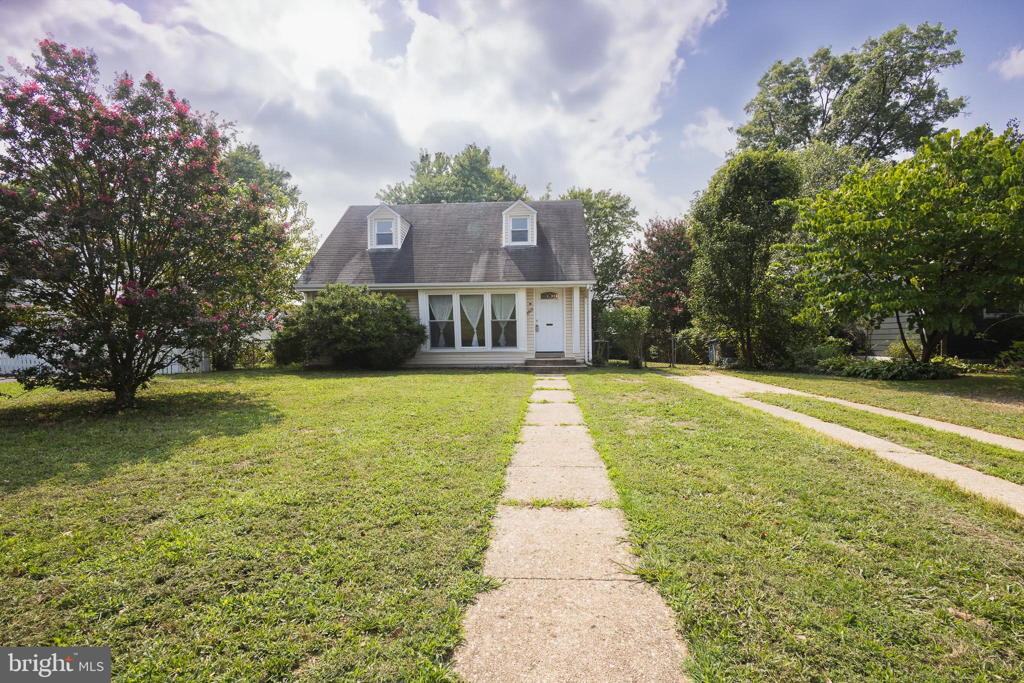 Experience the allure of this beautiful and well located home featuring 4 bedrooms and 2 full bathrooms, offering a perfect blend of vintage charm and modern convenience. The classic hardwood floors add warmth and character throughout, while expansive windows allow natural light to pour in, creating a bright and inviting atmosphere. The large fenced in backyard provides ample space for outdoor activities, gardening, or simply relaxing in privacy. Located in the desirable Bucknell Manor neighborhood, located just a stone's throw away from Old Town Alexandria, National Harbor, and Downtown DC. Easy commute with the bus stop just across the street and easy access to Huntington Metro, and I-495. Walking distance to GW Parkway, White Oaks park, and Mt. Vernon Rec Center. This home features a long driveway and lots of street parking. In-unit washer/dryer. Pets case by case. This home is an ideal spot for those looking to enjoy suburban tranquility with easy access to the city. Don't miss this rare opportunity to rent in a historic and well-connected neighborhood!