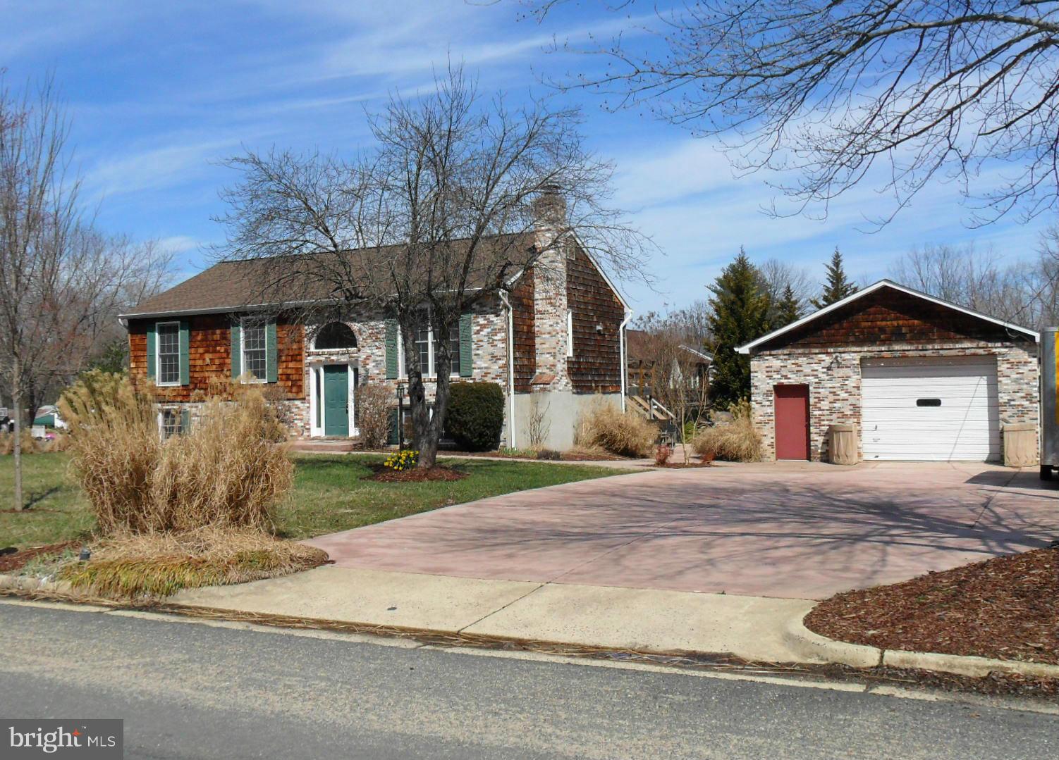4 bedroom, 4 bath Home with Huge garage. Sitting on .41 acres, deck off kitchen, overlooking stamped concrete patio in backyard surrounded by a garden. Over 2400 fin sqft, Vaulted ceiling in Lvrm, attic fan,  The separate garage has approx. 1400 sqft and 11  ceiling, 1/2 bath and office, own breaker box. *NO HOA* 1 min to rt 28, 5 min to rt 66.