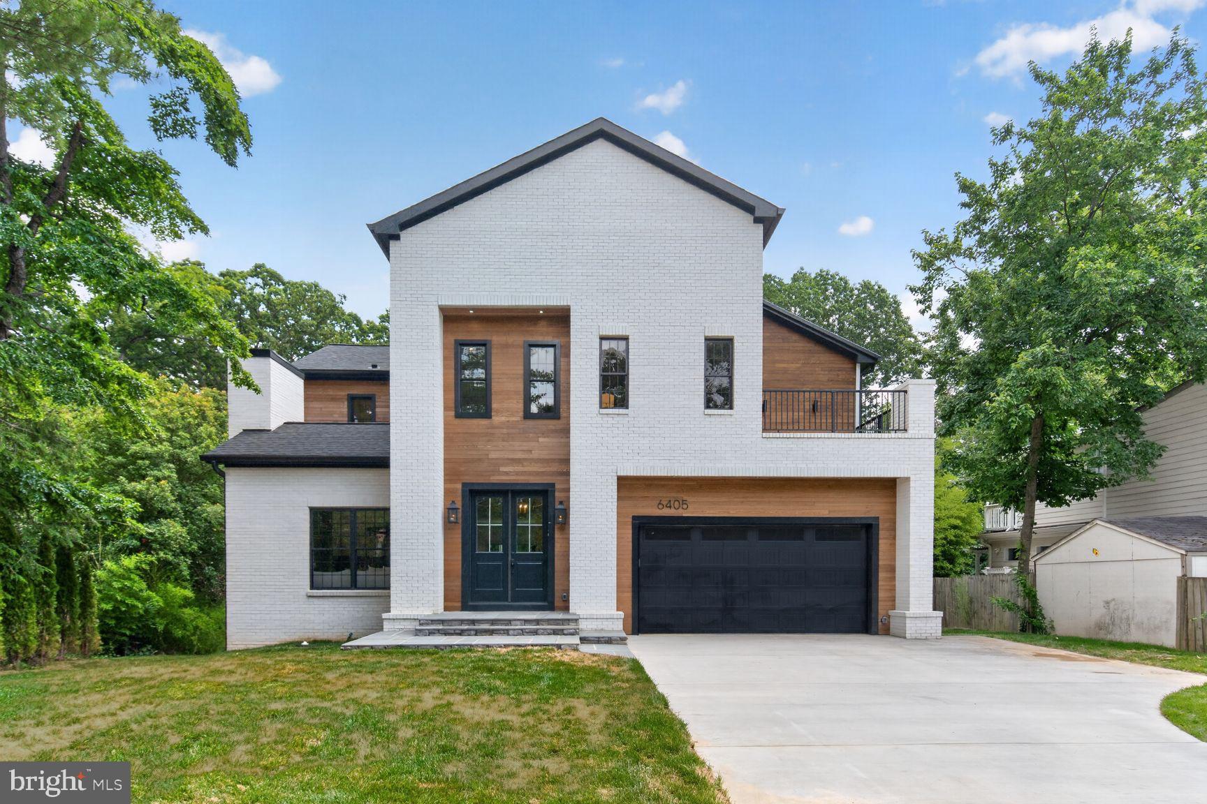 Introducing a stunning new custom-built home just finished in the sought-after Belle Haven neighborhood of Alexandria. This modern colonial residence combines timeless elegance with contemporary design, featuring six bedrooms and five-and-a-half baths. Beautiful wide-plank white oak floors throughout, custom cabinetry, a high-end appliance suite, and designer finishes throughout. 

The main level welcomes you with a formal living room that flows seamlessly into the expansive great room, featuring a gourmet kitchen with a large center island, a spacious family room, and dining area. A first-floor bedroom suite offers accessibility, ideal for guests. Additional features include a private office, stylish powder room, and mudroom as you enter from the spacious two-car garage. The main level extends to a large, raised deck, perfect for outdoor entertaining. 

The upper floor features four generous bedrooms and three baths. The luxurious primary suite includes a private balcony overlooking the backyard, a spa-like bathroom with a soaking tub, a large walk-in shower, a double vanity, and a water closet, as well as a fully finished walk-in closet with built-in storage and a center island. A second living or reading room for a quiet getaway with access to an upper terrace offers additional gathering space. 

The lower level has been designed for entertainment and functionality, with a family room and large flex space, a dedicated exercise room, built-in wine cellar, and a private bedroom with full bath. This level opens to a patio and spacious backyard, ideal for outdoor activities. 

Perched atop the Belle Haven neighborhood, this home offers serene privacy with a wooded natural barrier in the rear. It is located adjacent to the Belle Haven Country Club, which provides members with exceptional amenities, including an 18-hole golf course, tennis facilities, a swimming pool, and fine dining. The neighborhood is five minutes from historic Old Town Alexandria, offering premier dining, shopping, and waterfront activities. Proximity to the Potomac River ensures easy access to marinas, boating, and outdoor recreation. The area also features the Mount Vernon Trail for biking and running, as well as the newly renovated Mount Vernon Rec Center with its Olympic pool, two hockey rinks, and fitness facilities. This property offers an exceptional opportunity to enjoy modern luxury in a classic and vibrant community!