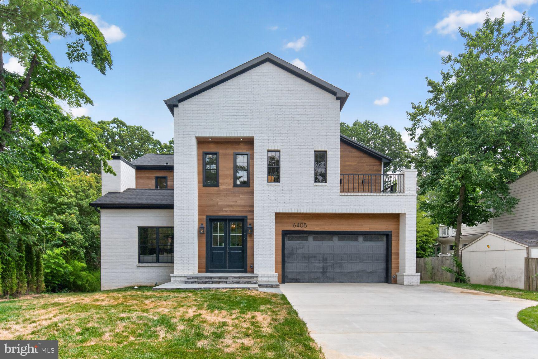 Introducing a stunning new custom-built home just finished in the sought-after Belle Haven neighborhood of Alexandria. This modern colonial residence combines timeless elegance with contemporary design, featuring six bedrooms and five-and-a-half baths. Beautiful wide-plank white oak floors throughout, custom cabinetry, a high-end appliance suite, and designer finishes throughout. 

The main level welcomes you with a formal living room that flows seamlessly into the expansive great room, featuring a gourmet kitchen with a large center island, a spacious family room, and dining area. A first-floor bedroom suite offers accessibility, ideal for guests. Additional features include a private office, stylish powder room, and mudroom as you enter from the spacious two-car garage. The main level extends to a large, raised deck, perfect for outdoor entertaining. 

The upper floor features four generous bedrooms and three baths. The luxurious primary suite includes a private balcony overlooking the backyard, a spa-like bathroom with a soaking tub, a large walk-in shower, a double vanity, and a water closet, as well as a fully finished walk-in closet with built-in storage and a center island. A second living or reading room for a quiet getaway with access to an upper terrace offers additional gathering space. 

The lower level has been designed for entertainment and functionality, with a family room and large flex space, a dedicated exercise room, built-in wine cellar, and a private bedroom with full bath. This level opens to a patio and spacious backyard, ideal for outdoor activities. 

Perched atop the Belle Haven neighborhood, this home offers serene privacy with a wooded natural barrier in the rear. It is located adjacent to the Belle Haven Country Club, which provides members with exceptional amenities, including an 18-hole golf course, tennis facilities, a swimming pool, and fine dining. The neighborhood is five minutes from historic Old Town Alexandria, offering premier dining, shopping, and waterfront activities. Proximity to the Potomac River ensures easy access to marinas, boating, and outdoor recreation. The area also features the Mount Vernon Trail for biking and running, as well as the newly renovated Mount Vernon Rec Center with its Olympic pool, two hockey rinks, and fitness facilities. This property offers an exceptional opportunity to enjoy modern luxury in a classic and vibrant community!