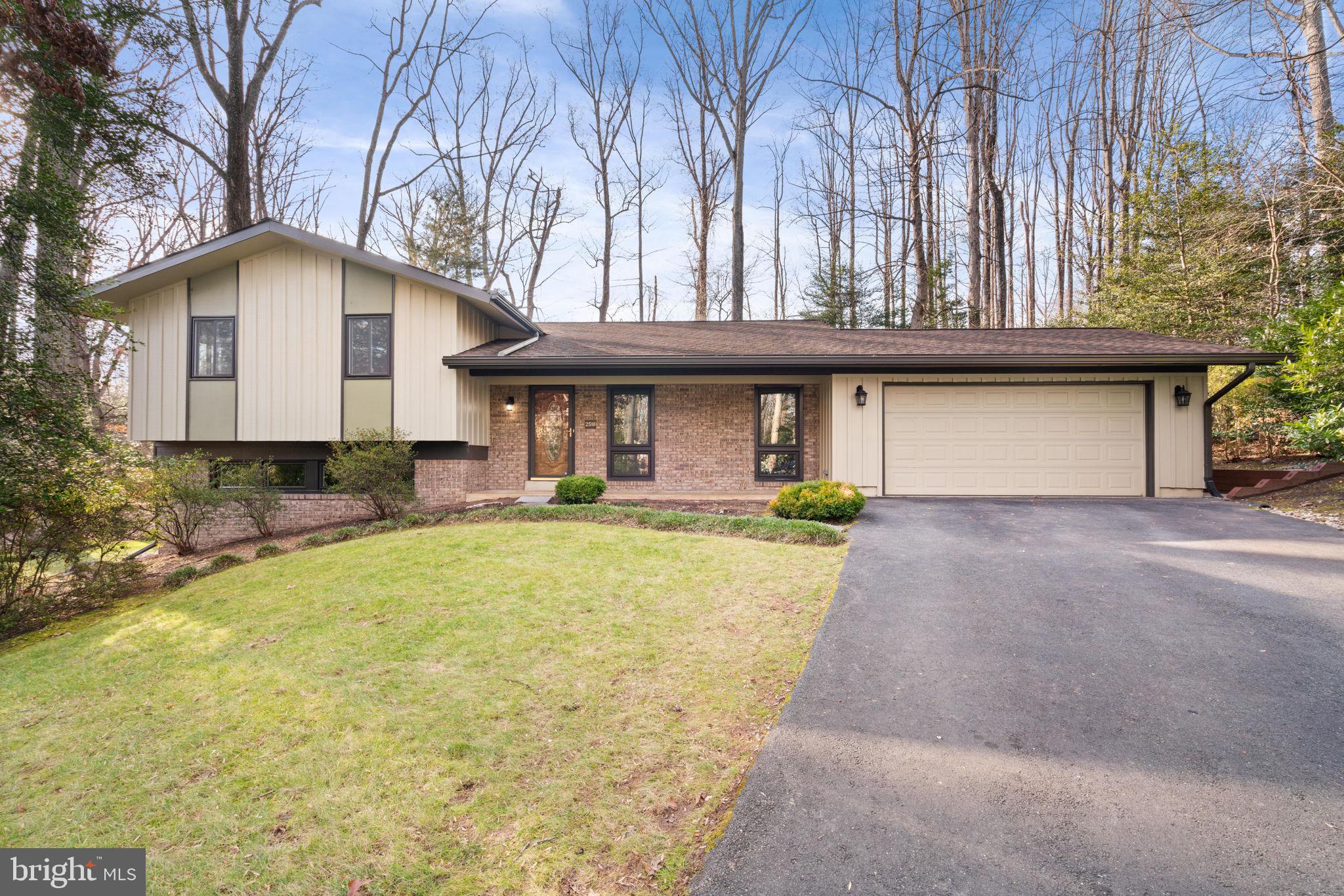 Offer Deadline Monday January 15th at 5pm. Impeccably remodeled 5 bedroom 3 full bath home nestled on a quiet cul-de-sac in Reston! No need to lift a finger, this move in ready home features a spacious entry way that ushers you quickly into the beautifully remodeled chef’s kitchen. No detail spared from the two-tone 42 inch navy and white cabinets, the stainless steel farmhouse sink, stunning quartz counters, subway tile backsplash and new stainless steel appliances. The kitchen also features a spacious eat in area, spacious pantry, abundant natural light from the large front windows and access to the two car garage. Enjoy entertaining family and friends in the large dining and living room that are open to the kitchen. Easily extend your entertaining outside from the large sliding doors that lead out to the spacious deck. The backyard features private wooded views and a large flat yard. Back inside make your way upstairs to find gleaming refinished hardwood floors flowing throughout each of the 3 guest bedrooms, these rooms share a fully remodeled hall bath and the wood floors continue into the private primary bedroom. A true respite after a long day the primary suite features a Juliet balcony overlooking the private backyard, a walk in closet and a beautiful en-suite bath with dual sinks and a large shower with beautiful tile work and glass shower door. Head down to the fully finished walkout basement with its plush new carpet and large rec room with a cozy gas fireplace. A full bath and additional 5th bedroom are located down here, there’s access outside from the 5th bedroom. A storage room and laundry area complete the basement level. The top notch location of this home cannot be beat situated on a quiet wooded street and featuring a long extended driveway off the 2 car garage, plenty of parking for everyone. Easy commuting access being just off of Lawyers Rd, convenient to Reston Pkwy and the Dulles Toll Road. Only 10 minutes from Reston Town Center and the Wiehle-Reston Metro Station. All this while being part of the amenity rich Reston Association with its multiple lakes, miles of walking trails, pools, tennis and pickle ball courts, playgrounds and more!