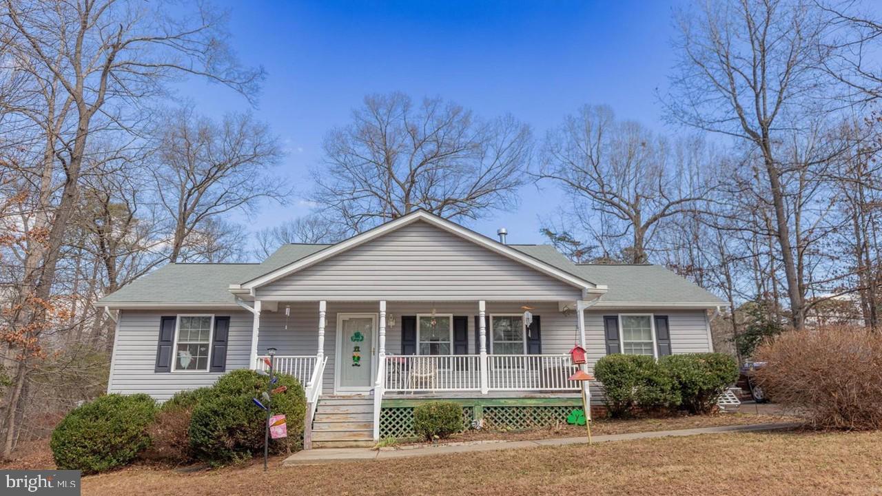 Adorable Ranch home on a nice size lot in Beautiful Lake Land Or! Home has a Split Bedroom Floor Plan with Living Area & Kitchen in the middle. Living Room with corner fireplace, Dining Area, Breakfast Bar off Kitchen. Large Laundry Room, Pull Down - Stairs for more storage in the Attic & a Fully encapsulated Crawlspace perfect for more Storage. Rear deck for BBQ & plenty of room in your back yard for a garden as well. Come check it out! Lake Land Or has all types of Amenities like:   Pool, Clubhouse, Fitness Room, Fishing, Swimming, Wakeboard, Waterski, Kayaking, Pontoon & Paddle Boarding. Tennis, Pickleball, Basketball Too. Playgrounds throughout & Recreation Committee with all types of Community Activities
throughout the year. Lake Land Or is located 3 miles off I-95 between Ashland & Fredericksburg - perfect location for Commuters all around. Close to Golf, YMCA, Caroline Public Library, Community Theater, Shopping, Wineries, Dominion Raceway & the New Kalahari Waterpark coming SOON