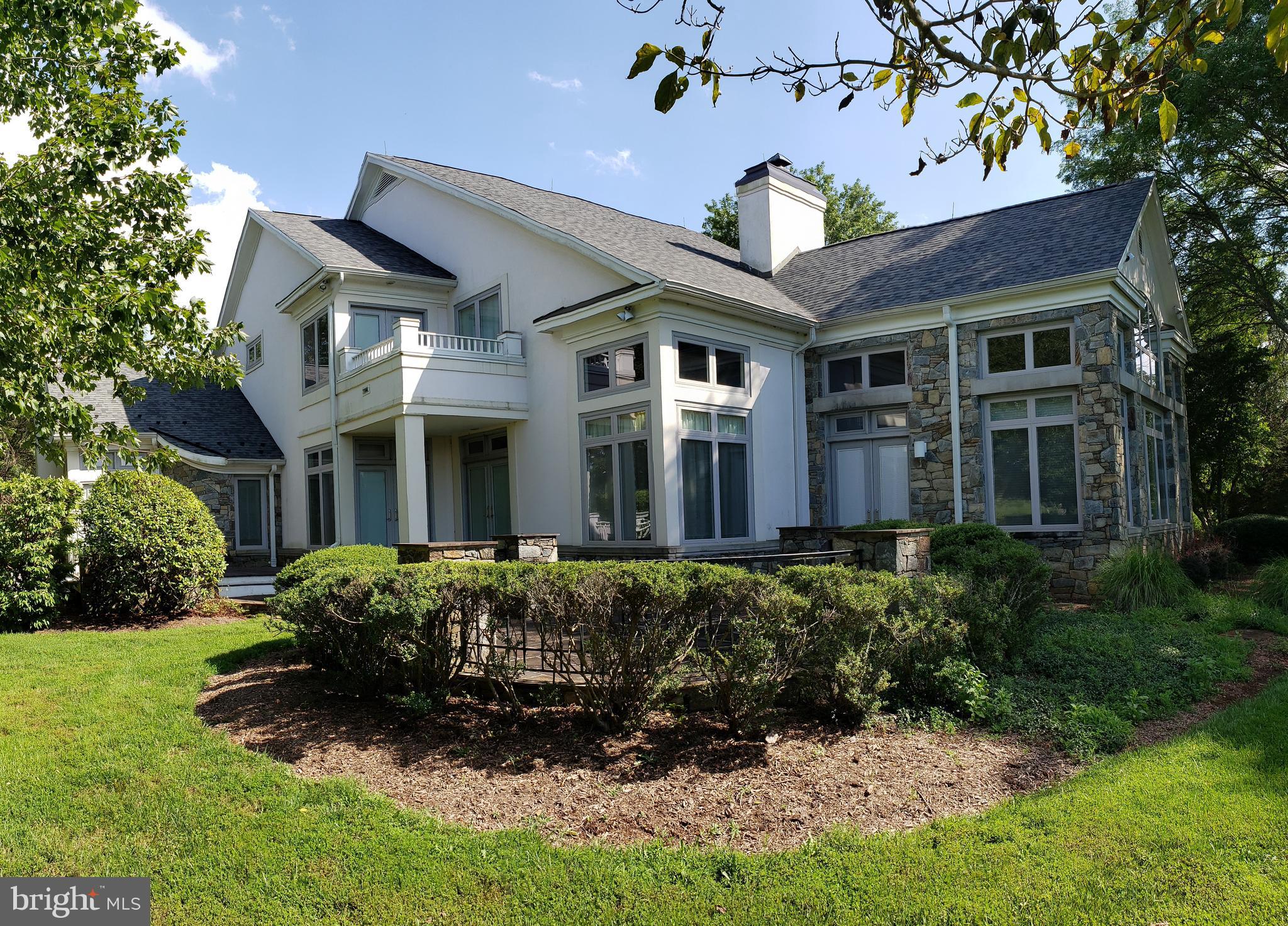 Located just a mile and a half from Washington Virginia on scenic Tiger Valley Rd this gated 40+-acre estate has a custom built stone and stucco contemporary home with 3 car garage and a separate one bedroom guest house which has a 2 car basement garage. The home is nicely sited and accessed by a winding paved driveway which is lighted. Inside are soaring ceilings and a gorgeous curved staircase central to the main level is a two sided stone fireplace. The main level master suite has a fireplace in the bedroom, a full bath, study and sitting area. The upstairs features an additional 3 bedrooms with attached bathrooms.   Note the farmer who grazes the fields has a lease which continues to the end of 2024.  Owners reserve the right to possession for 30 days after settlement to allow them to remove their furniture and other personal property.