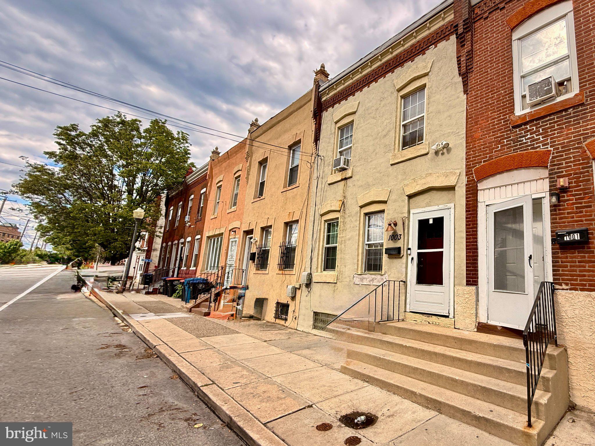 Welcome to 1003 Madison Street in Chester, PA—an exceptional opportunity for investors or savvy buyers looking for a well-maintained property with built-in income potential! This charming rowhome is tenant-occupied on a month-to-month lease, with a tenant who would like to stay and is currently in good standing. Let’s explore this smart investment opportunity.

Step into the open-concept living and dining area, where a seamless flow invites comfort and versatility for tenants or future plans. The spacious kitchen features ample storage, generous counterspace, and even room to explore culinary possibilities. Off the kitchen, you’ll find a convenient mudroom with laundry hookups and additional storage—a practical bonus that ensures this home stays effortlessly functional.

Upstairs, natural light pours into the primary bedroom, creating a welcoming retreat at the front of the home. Two additional guest rooms offer flexibility for bedrooms, a workspace, or storage. The single bathroom is perfectly situated to serve the entire second floor.

Outside, a small back deck overlooks a vacant lot and offers space for relaxing while maintaining the low-maintenance appeal of the property. With a total of 1,240 square feet of interior space and a 1,089-square-foot lot, this compact yet efficient home maximizes potential.

Whether you’re adding to your portfolio or looking for future possibilities, this home checks all the boxes. Don’t miss your chance to own this charming property on 1003 Madison Street—your smart, low-maintenance investment awaits! Schedule your showing today.