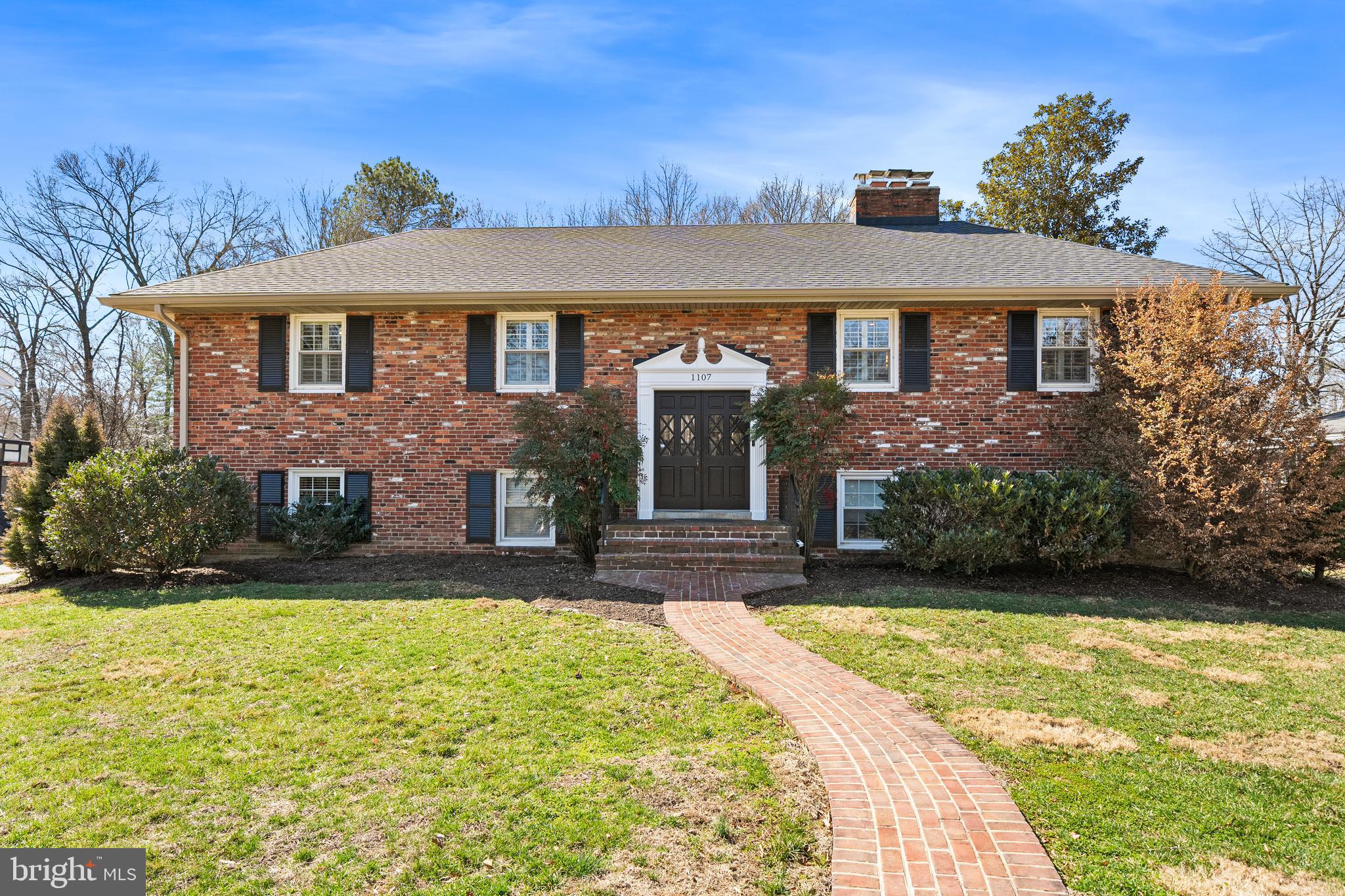 Welcome to 1107 Potomac Lane, a beautifully renovated Cambridge model tucked into the heart of the beloved Waynewood Elementary community, one of Fort Hunt’s most cherished neighborhoods known for its sidewalks, walk-to-school lifestyle, and strong sense of community. With over $350,000 in thoughtful improvements in the last 4 years, this exceptional residence offers the perfect blend of timeless charm, modern updates, and effortless indoor-outdoor living designed with today’s families in mind.

Offering over 3,000 finished square feet across two levels, the home features 5 bedrooms, 3 full baths, and a 1-car garage, providing generous space for both everyday living and entertaining.

The sellers worked closely with Deluna Designs and Reico Kitchens to design an eat-in kitchen that blends warmth and character with modern functionality. GE Monogram appliances including a 48 inch gas range and 42 inch refrigerator.  A custom wood hood, 10 foot island, pot filler, 2 sinks, beverage fridge and separate ice maker are a few additional highlights. An original exposed brick wall, dramatic skylight, and a cozy wood-burning fireplace create a space that feels both elevated and welcoming. The entire main level showcases hardwood floors, recessed lighting, while the dining room opens to a sliding glass door to the Trex deck, seamlessly connecting indoor living with the backyard oasis beyond.

The backyard is truly a private retreat, designed for unforgettable gatherings and summer fun. On the oversized lot youll love the fully renovated pool (Kids pool fence also conveys), elegant new deck pavers, expansive Trex deck create the ultimate outdoor entertaining space.

Extensive recent improvements include a fully remodeled kitchen with new appliances (2023), refinished hardwood floors, all 3 baths remodeled (2017 and 2023), new rear siding, new roof and attic fan(2021), upgraded attic insulation (2022), Thompson Creek windows throughout (2010), a new washer and dryer (2025), and swimming pool re-plastered, new pool filter, pump, bubbler, and skimmer lines (2025) ensuring peace of mind for years to come.

Perfectly positioned in the Fort Hunt area, residents enjoy sidewalk-lined streets, easy walks to Waynewood Elementary and the Waynewood Recreation Association pool, and a vibrant neighborhood filled with block parties, bike rides, and community traditions. Just minutes from the GW Parkway, Old Town Alexandria, and countless shops and restaurants, this home offers the ideal balance of neighborhood charm and commuter convenience.

1107 Potomac Lane is more than a home—it’s the Fort Hunt lifestyle families dream of.

Open Sunday 4/19 from 1-3 PM