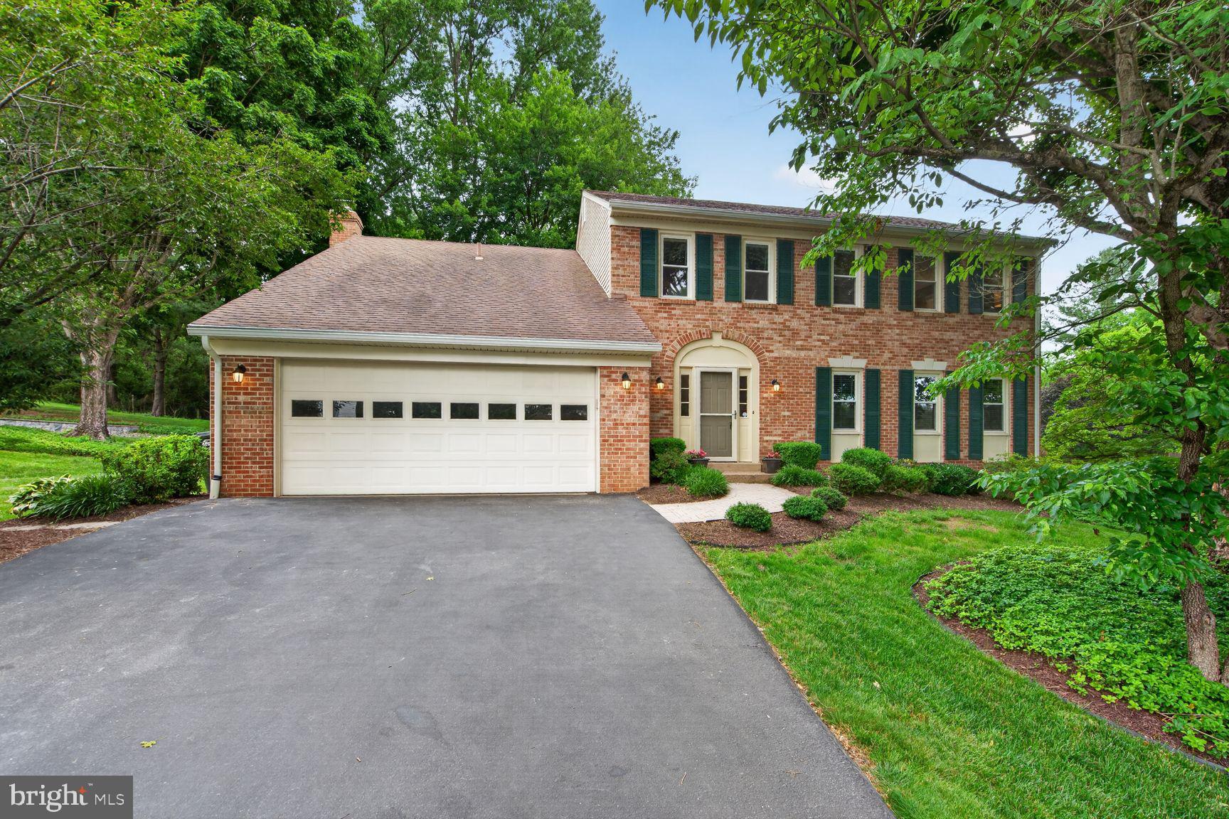 Beautifully maintained brick home offering 5 bedrooms, and 3.5 baths across three finished levels, ideally situated on a private lot backing to parkland in a peaceful cul-de-sac setting. Conveniently located just minutes from downtown Vienna, Wolf Trap, Tysons, the Metro, and major commuter routes, this home combines privacy, space, and an exceptional location.
The welcoming foyer features flagstone flooring, a coat closet, and a powder room. The main level offers refinished hardwood floors, crown molding, chair rail accents, and abundant natural light throughout. The formal living and dining rooms provide elegant entertaining spaces, while the updated kitchen features granite countertops, tile backsplash, stainless steel appliances, recessed lighting, and a spacious breakfast area. The adjoining family room includes hardwood flooring, a wood-burning fireplace with brick hearth and wood mantel, built-in bookcases, and French doors leading to the backyard.
Upstairs, brand-new carpeting extends throughout the bedroom level. The spacious primary suite includes a sitting room or home office, walk-in closet, multiple additional closets, and a beautifully updated bath with granite-topped vanity, brushed nickel fixtures, ceramic tile flooring, a frameless glass shower, and custom tile surround. Three additional bedrooms and an updated hall bath complete the upper level.
The finished walk-out lower level offers exceptional flexibility with a large recreation room featuring recessed lighting, a kitchenette area with refrigerator, microwave, sink, and cabinetry, an additional fifth bedroom with egress window, a full bath, and a versatile bonus room ideal for a home office, gym, or guest space. This level is well suited for an in-law suite or extended-stay guests.
Outdoor living is equally impressive with a private open backyard, mature trees, a large rear deck with built-in bench seating, and beautiful landscaping. Additional highlights include updated windows, a laundry room with front-loading washer and dryer, a two-car garage with extensive storage shelving and bike hooks, Tesla Charger, water filtration system, and a 2023 HVAC system and 2022 Water Heater.
Enjoy an exceptional lifestyle with direct access to nature, recreation, and commuter convenience. Backing to Meadowlark Botanical Gardens, tennis, pickleball, and basketball courts just down the street in Sun Valley Park, Wolf Trap National Park for the Performing Arts, the Gerry Connolly Cross County Trail, and the W&OD Trail this home offers endless opportunities for outdoor enjoyment. Residents will also appreciate the easy access to the Silver Line Metro, Reston, Tysons, and I-267. Combining spacious living, thoughtful updates, and a premier Vienna location backing to parkland, this is a rare opportunity not to be missed.